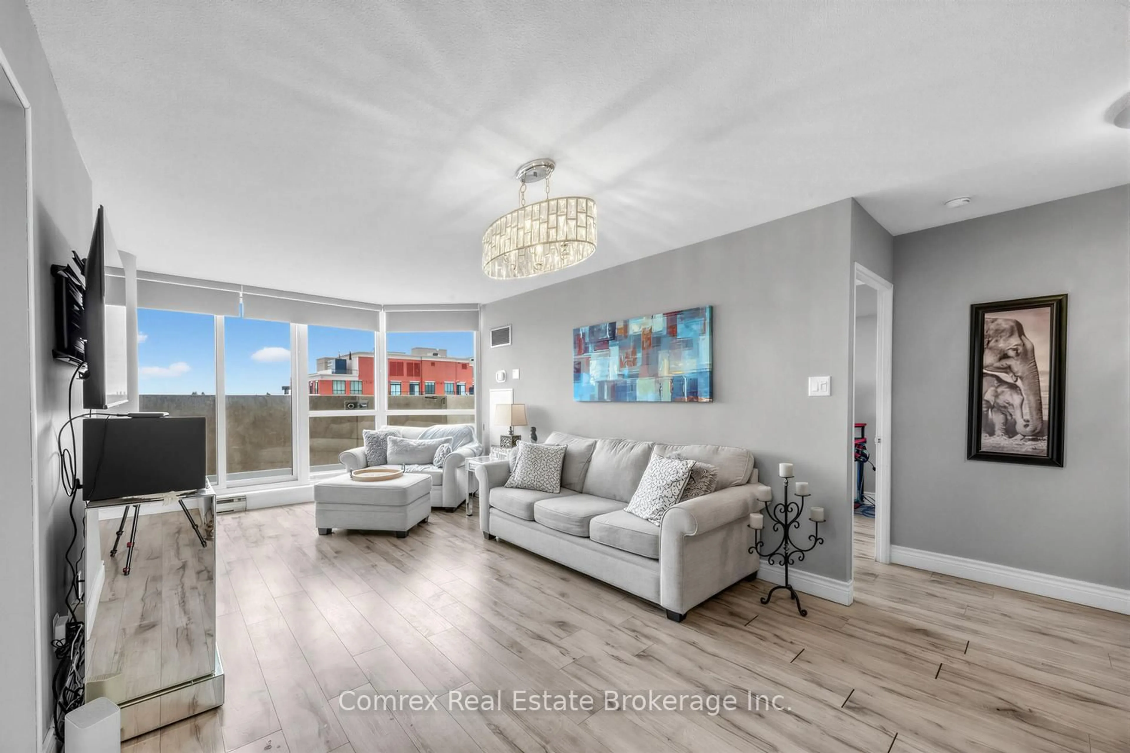 Living room with furniture, unknown for 3233 Eglinton Ave #704, Toronto Ontario M1J 3N6