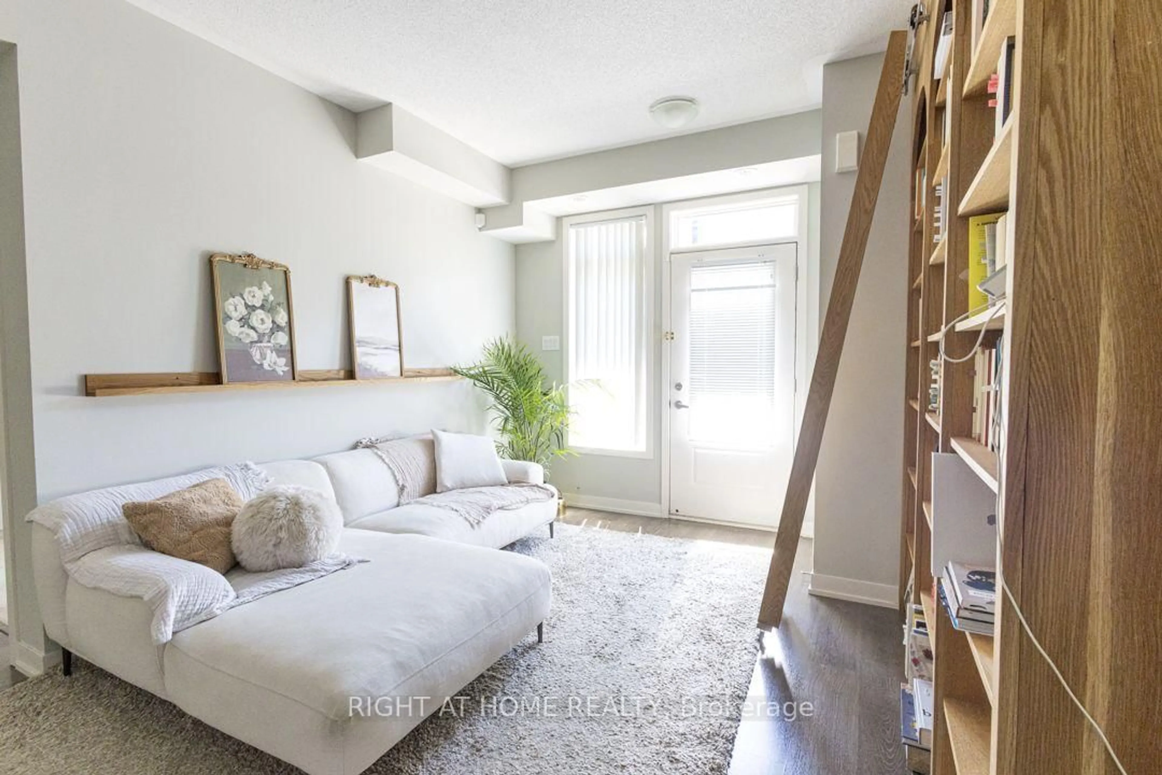 Living room with furniture, unknown for 60 Orchid Place Dr #15, Toronto Ontario M1B 0C4