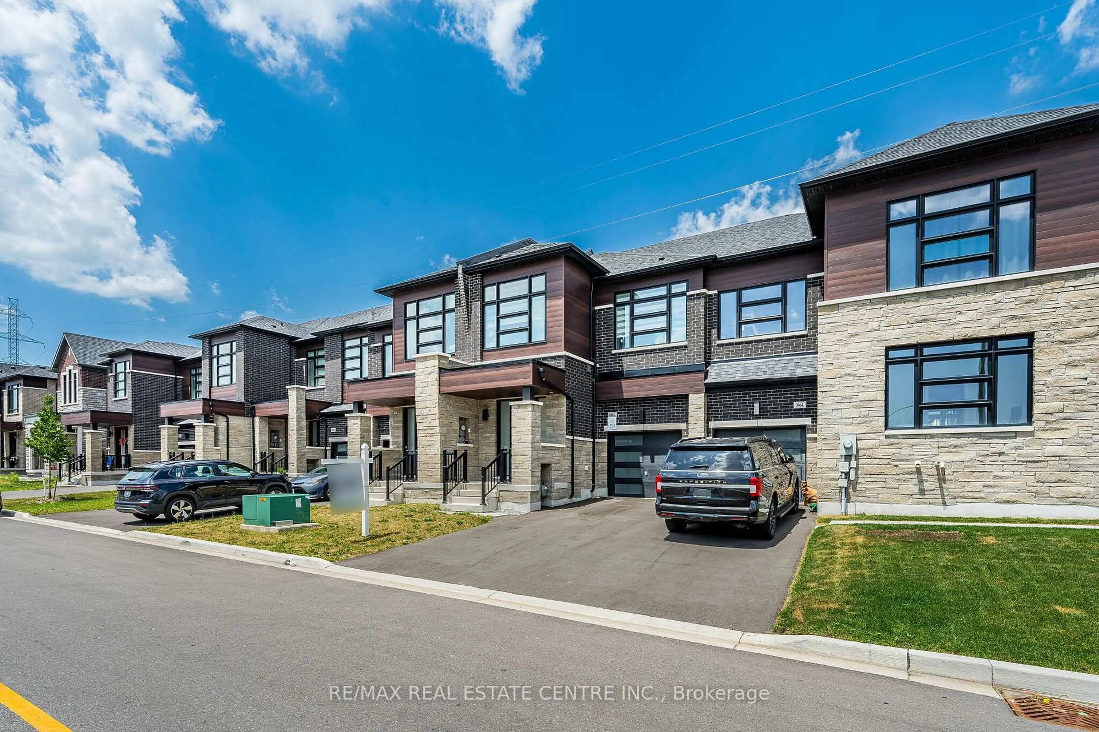 Home with brick exterior material, street for 1062 Skyridge Blvd, Pickering Ontario L1X 0G5