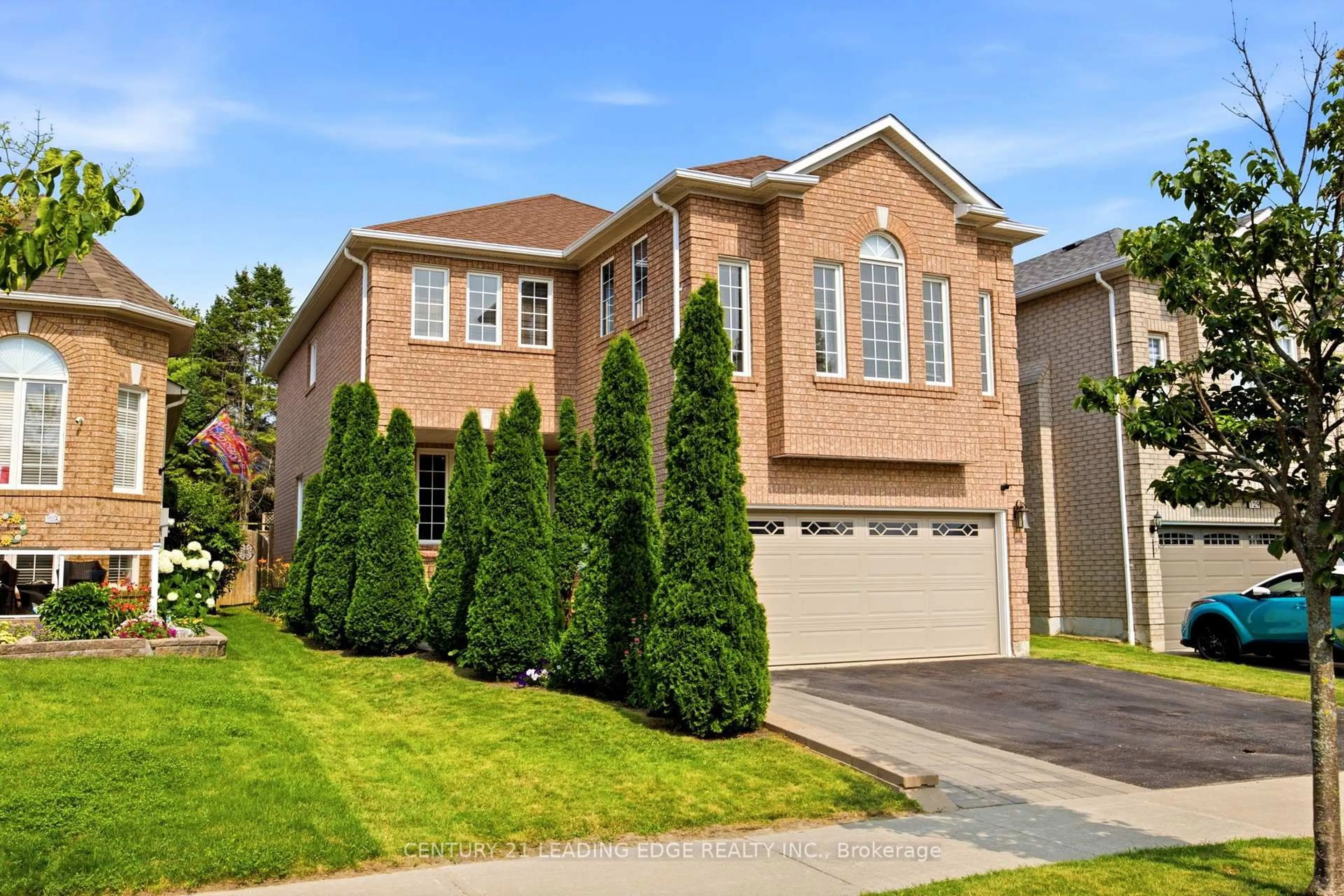 Home with brick exterior material, street for 131 Tom Edwards Dr, Whitby Ontario L1R 2S2