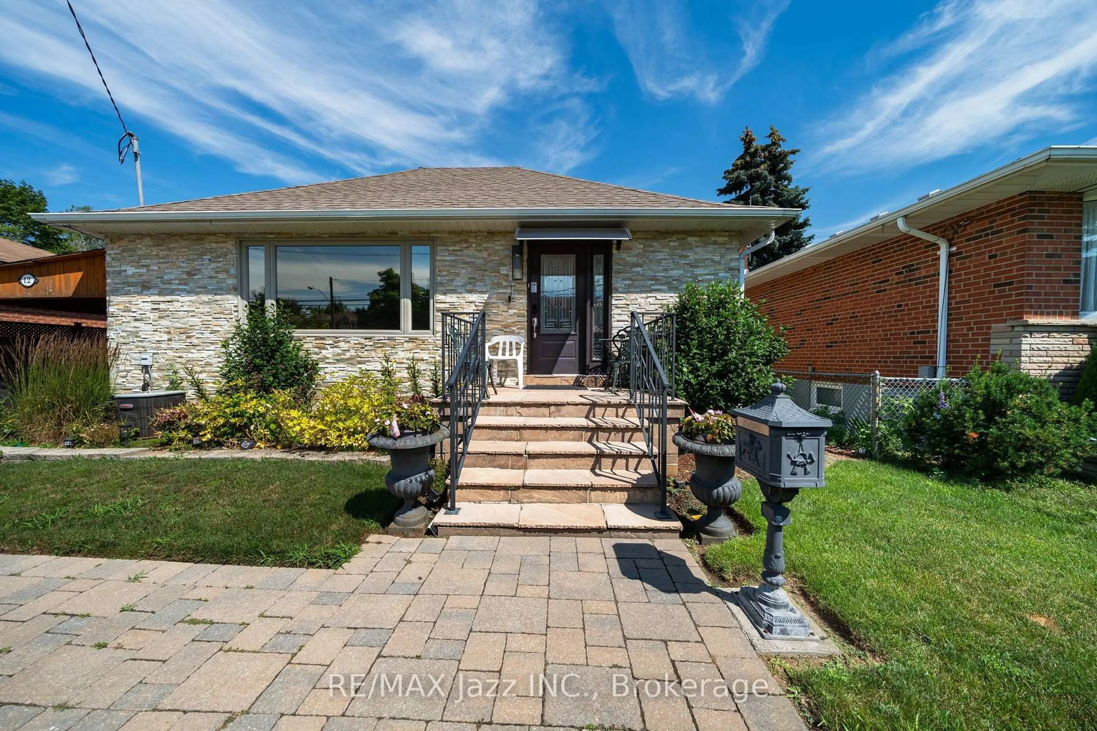 Home with brick exterior material, street for 12 Warnsworth St, Toronto Ontario M1E 2L9