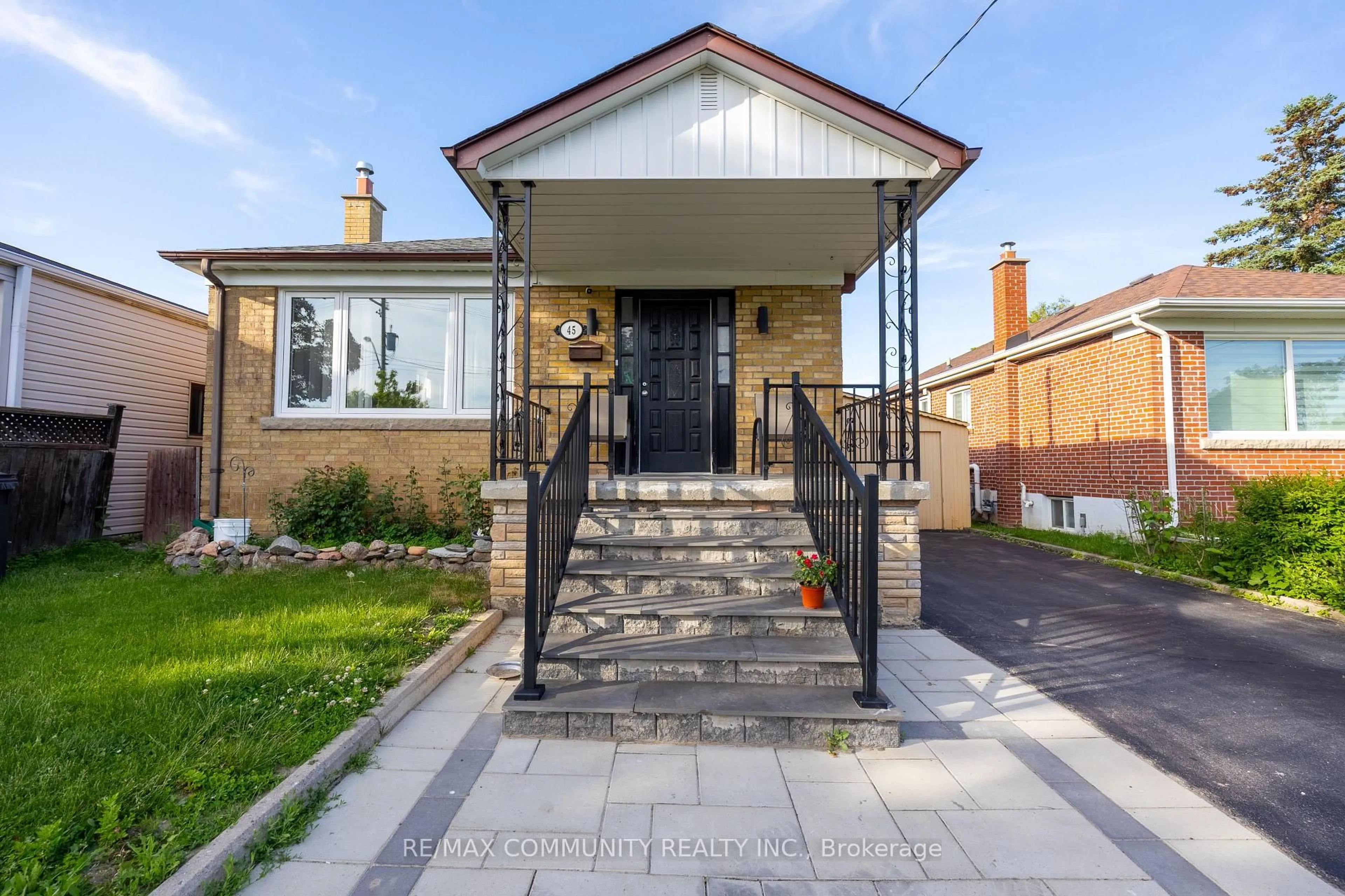 Home with brick exterior material, street for 45 Barrymore Rd, Toronto Ontario M1J 1W4
