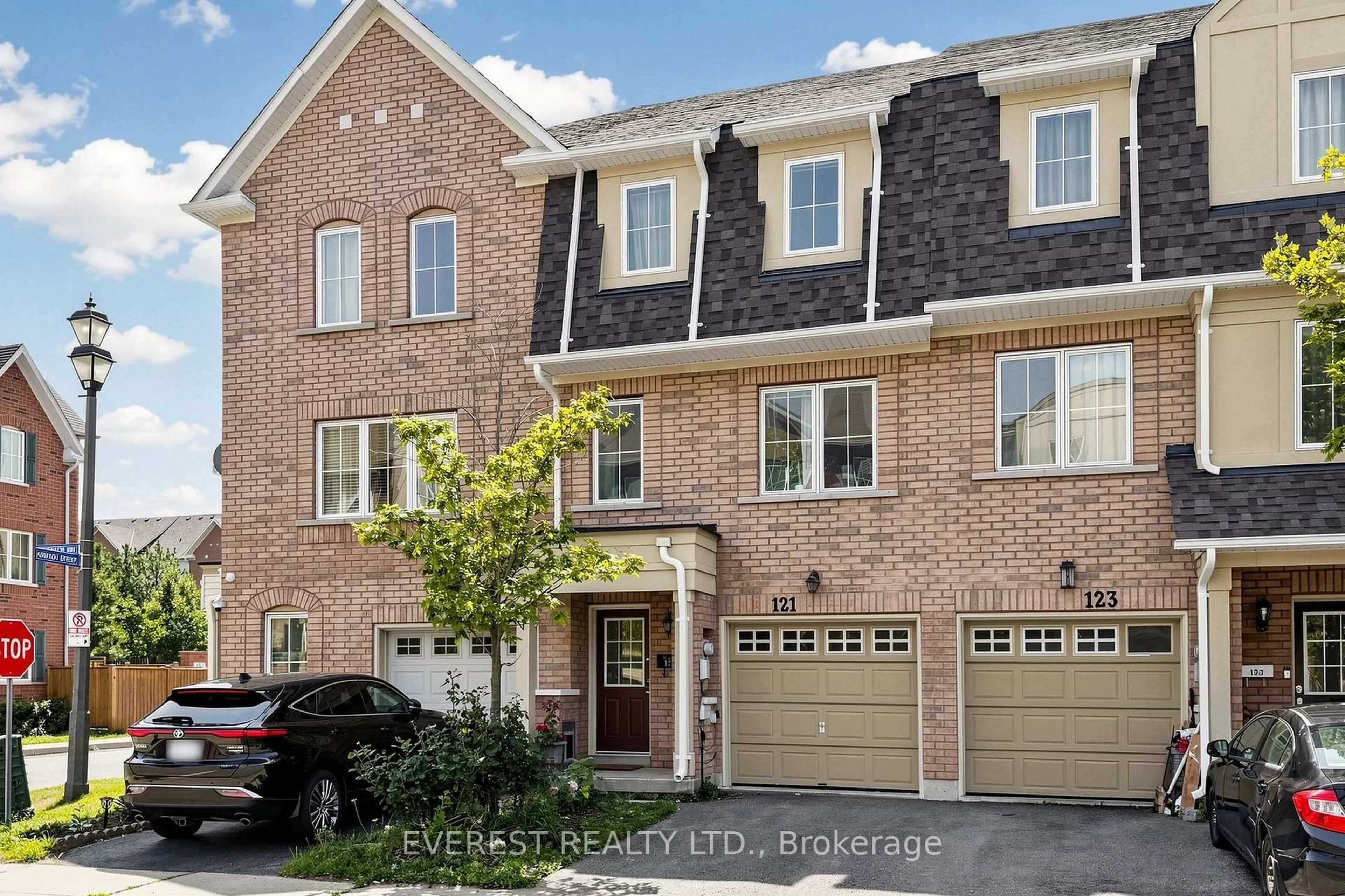 Home with brick exterior material, street for 121 Jenkinson Way, Toronto Ontario M1P 5H5