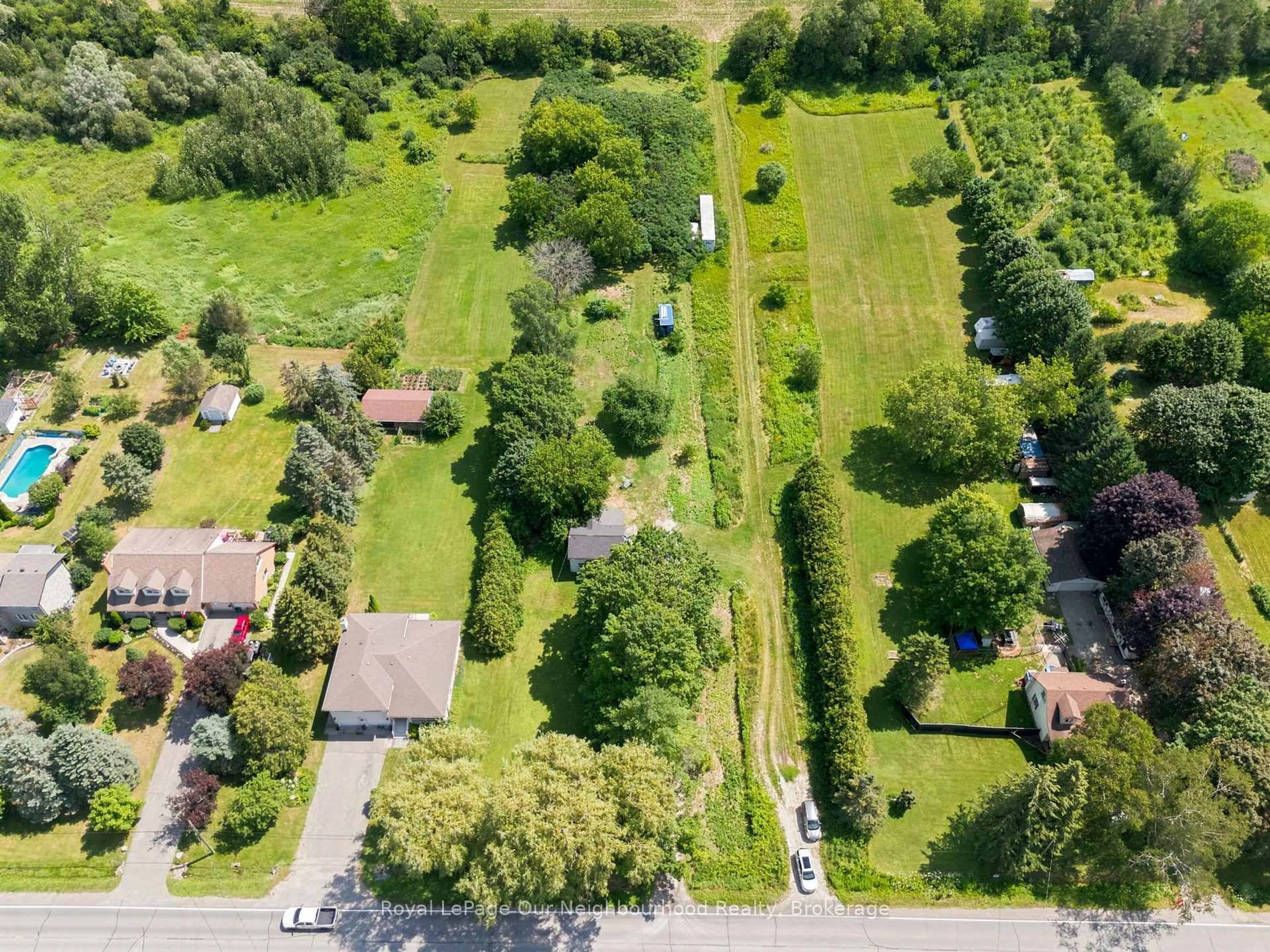 A pic from outside/outdoor area/front of a property/back of a property/a pic from drone, street for 4599 Trulls Rd, Clarington Ontario L0B 1J0