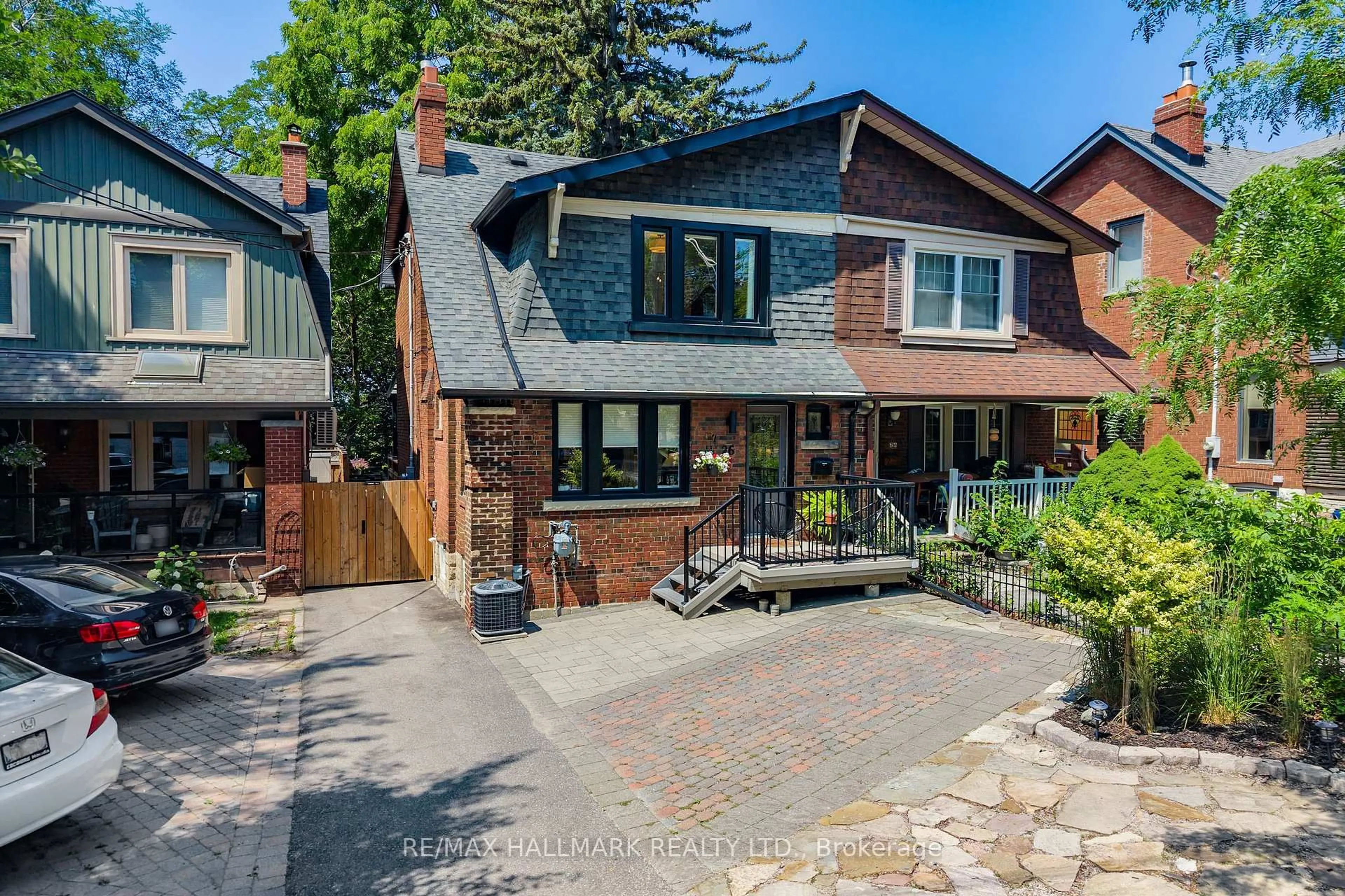 Home with brick exterior material, street for 26 Main St, Toronto Ontario M4E 2V4