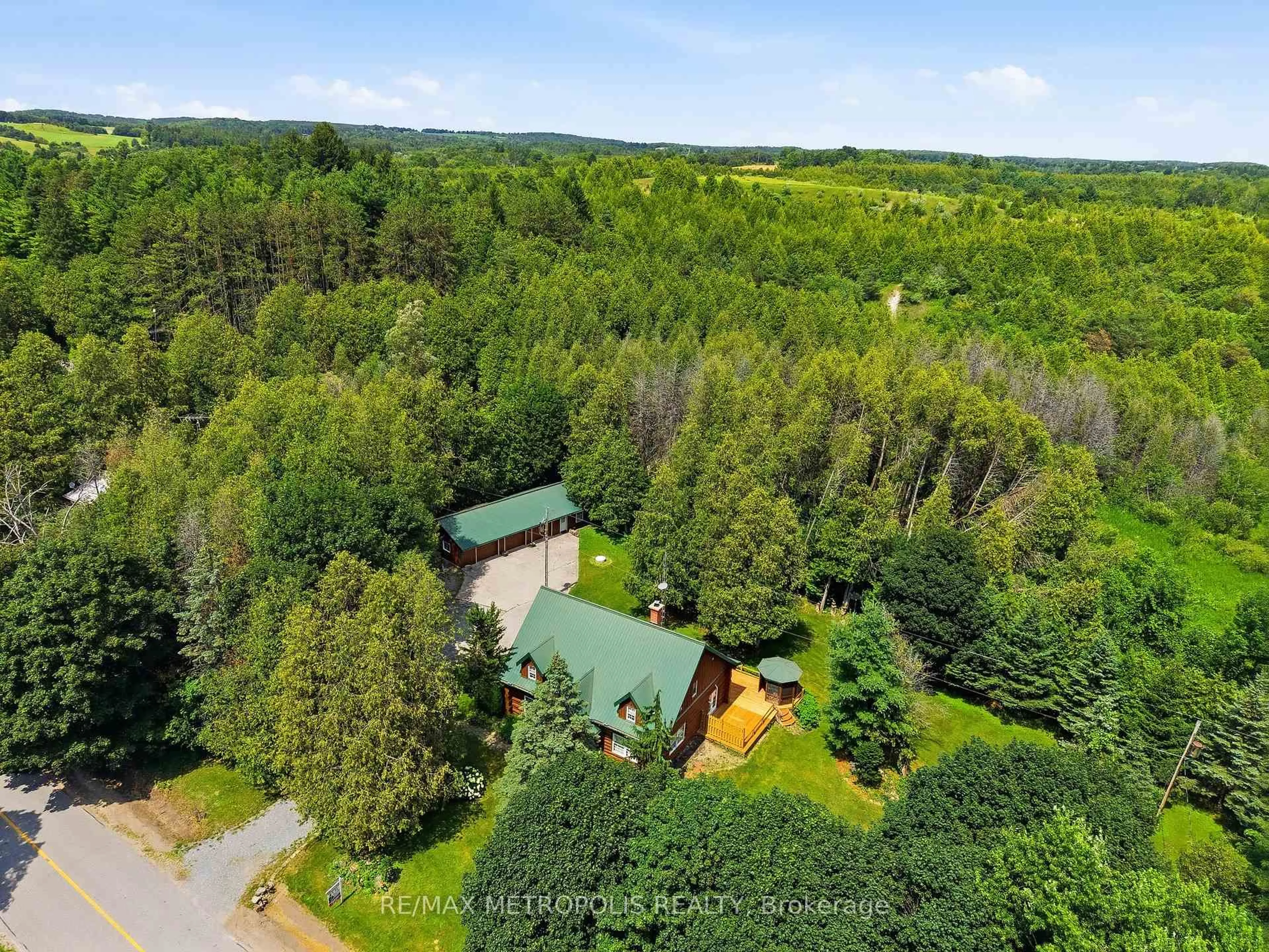A pic from outside/outdoor area/front of a property/back of a property/a pic from drone, forest/trees view for 7535 Leskard Rd, Clarington Ontario L0B 1M0