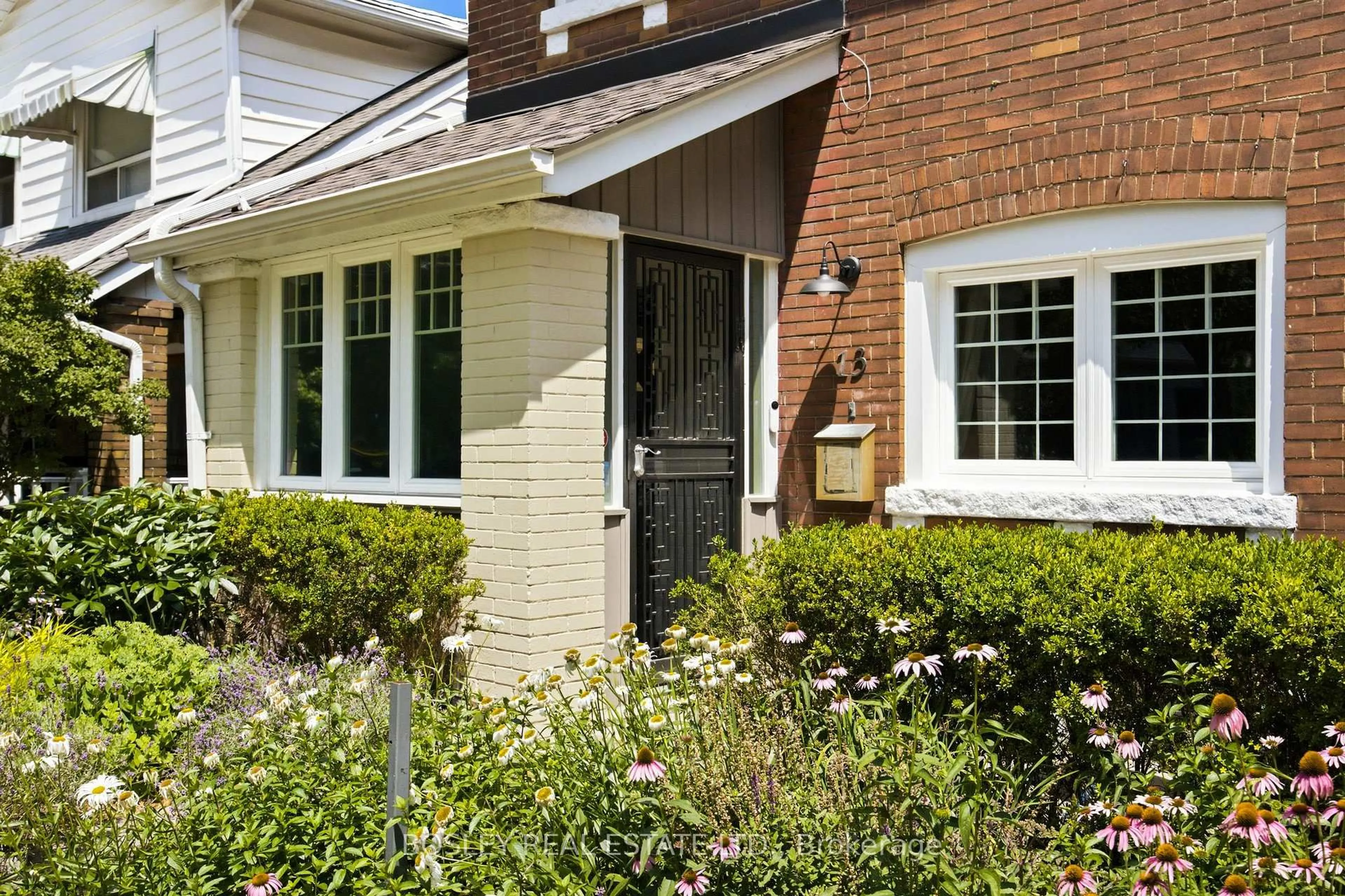 Home with brick exterior material, street for 13 Aldridge Ave, Toronto Ontario M4C 3W3
