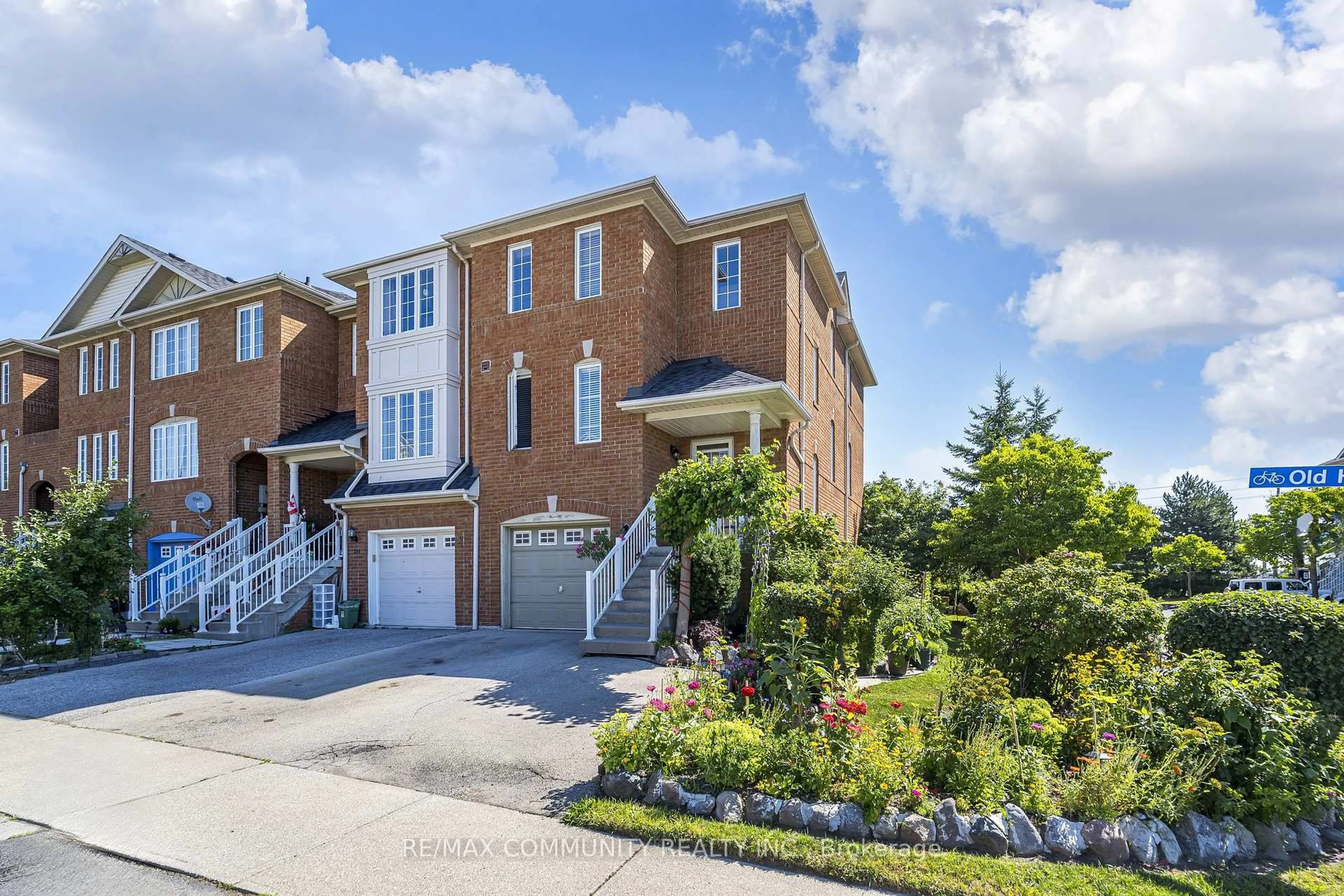 Home with brick exterior material, street for 209 Old Harwood Ave, Ajax Ontario L1Z 1N7