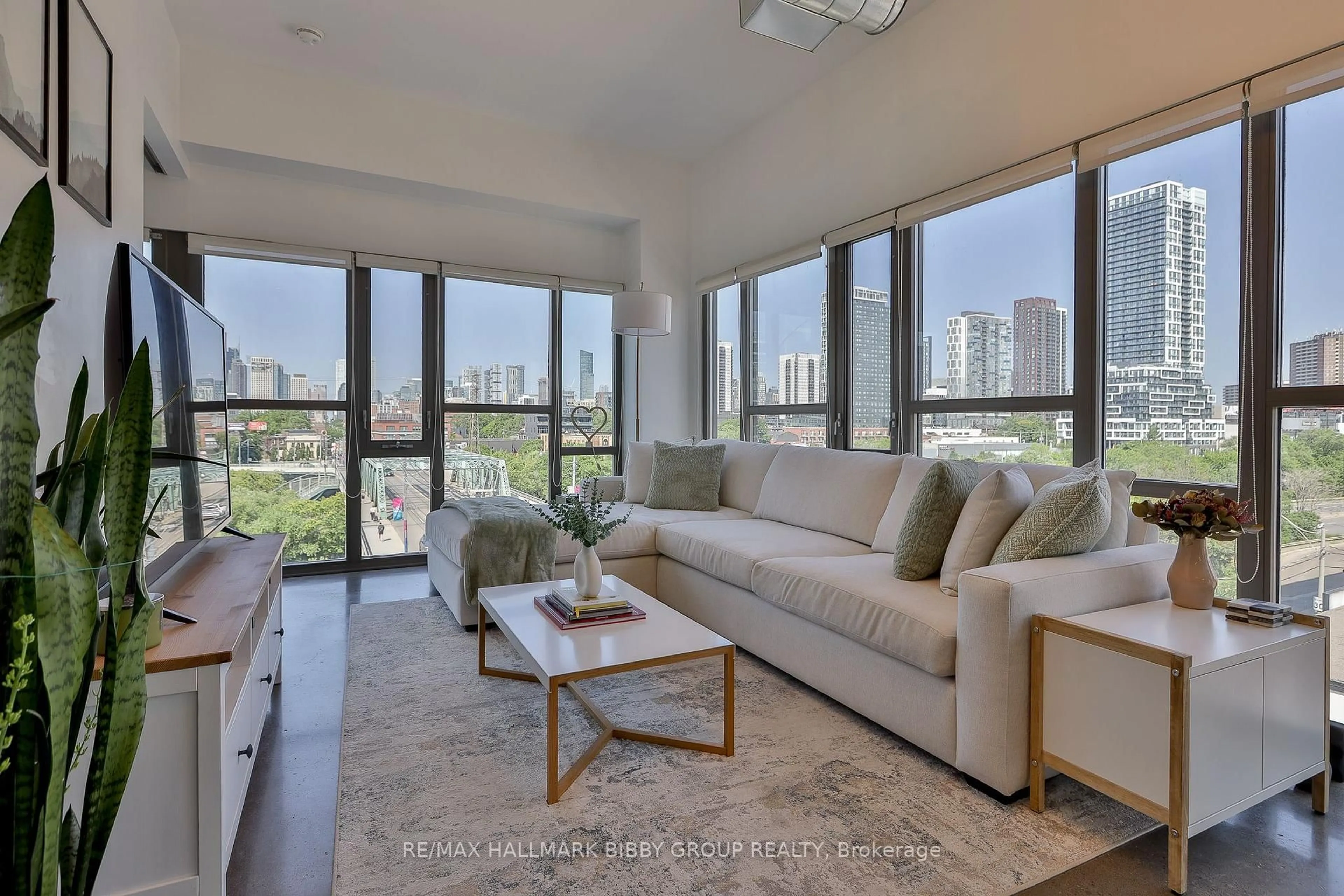 Living room with furniture, unknown for 625 Queen St #409, Toronto Ontario M4M 1G4