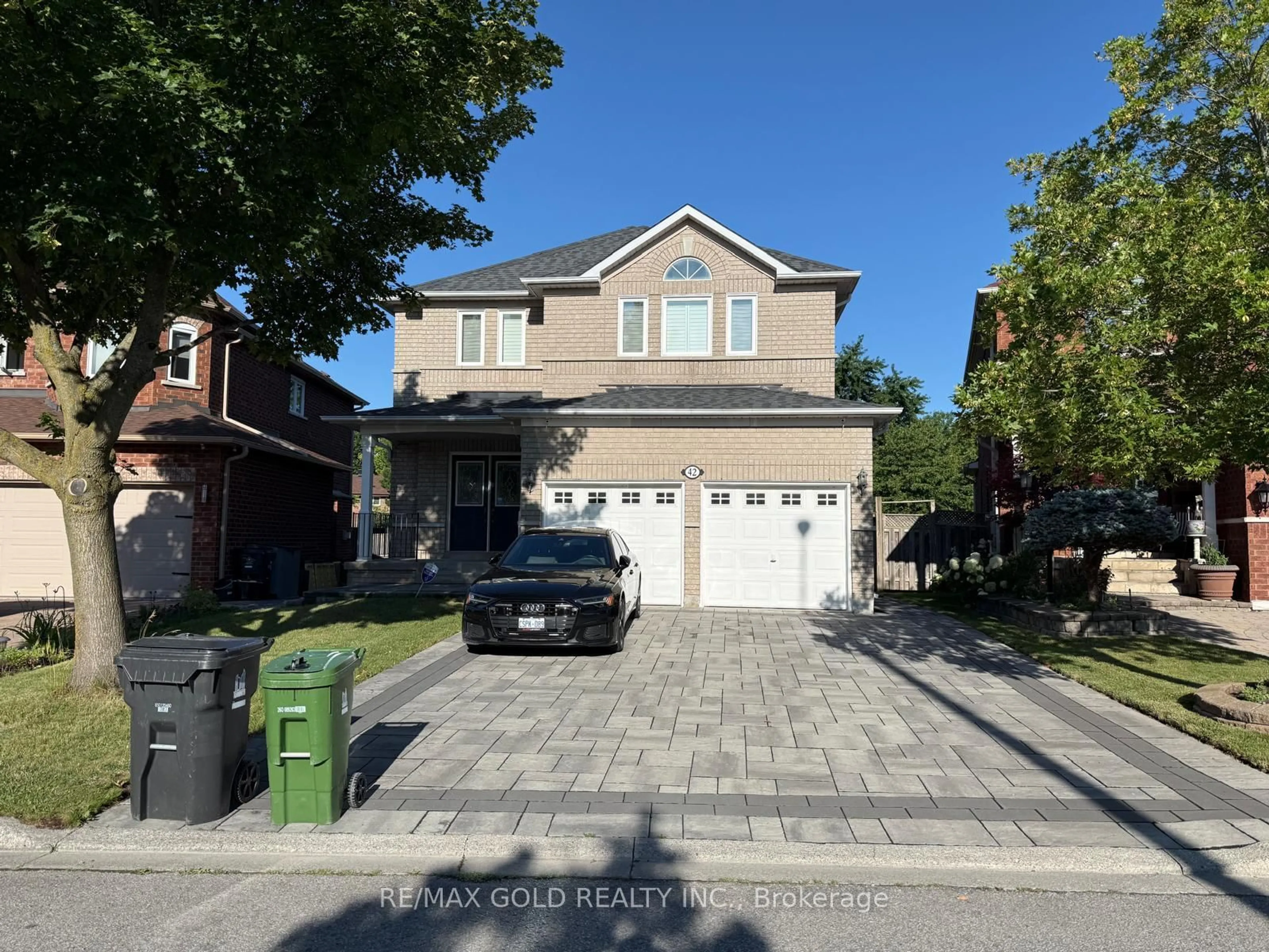Home with brick exterior material, street for 42 Stonebridge Blvd, Toronto Ontario M1W 4A7