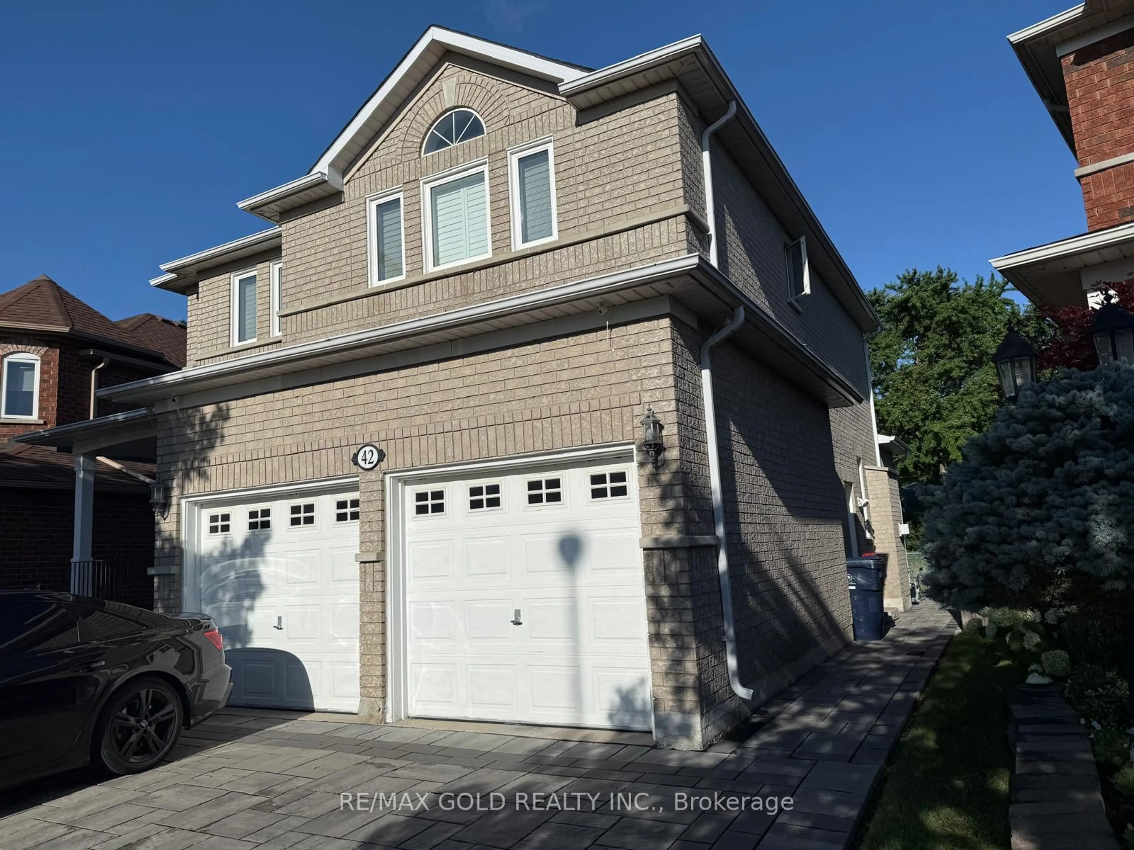 Home with brick exterior material, street for 42 Stonebridge Blvd, Toronto Ontario M1W 4A7