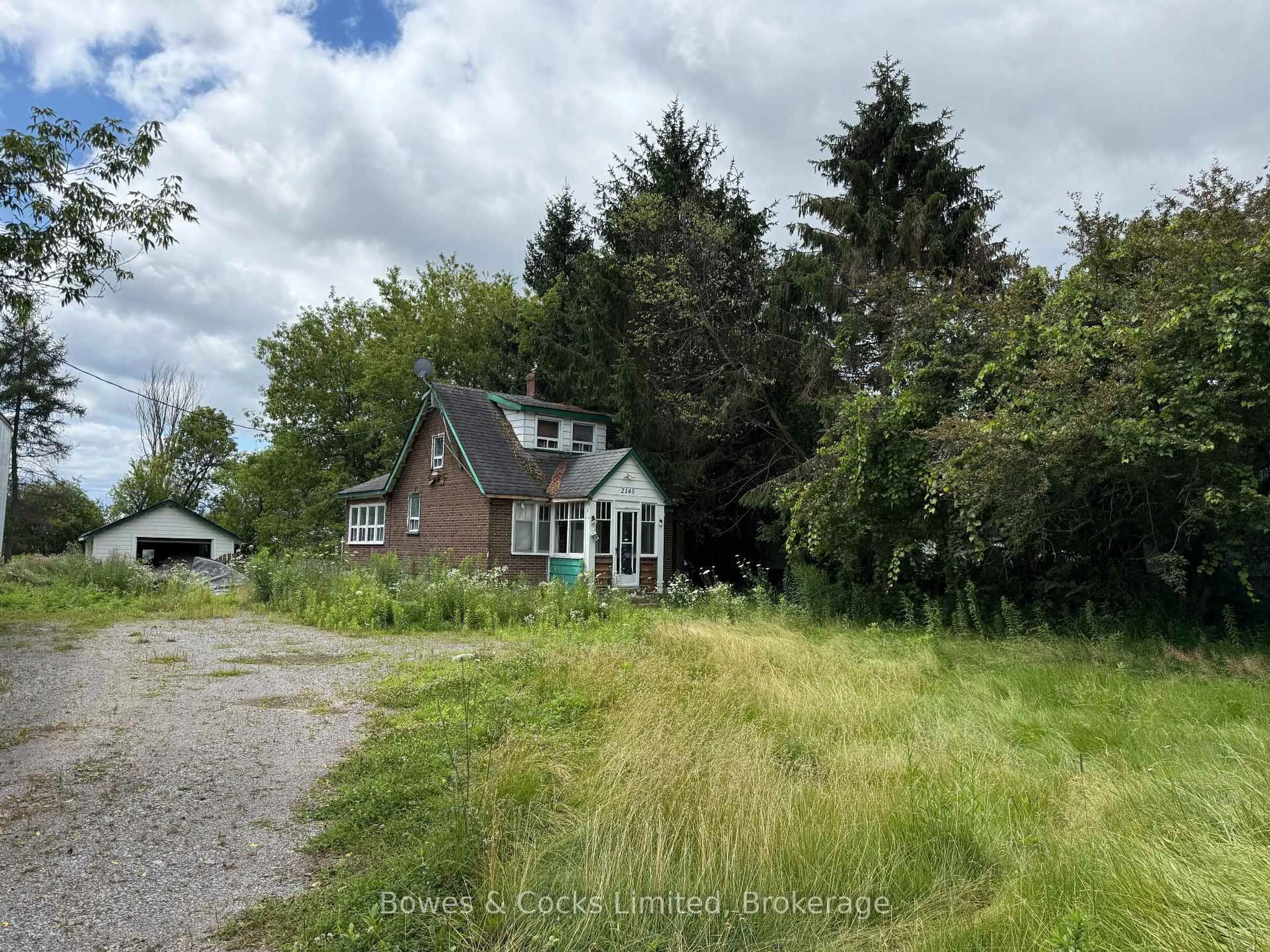 A pic from outside/outdoor area/front of a property/back of a property/a pic from drone, unknown for 2145 Highway 2, Clarington Ontario L1C 6G4