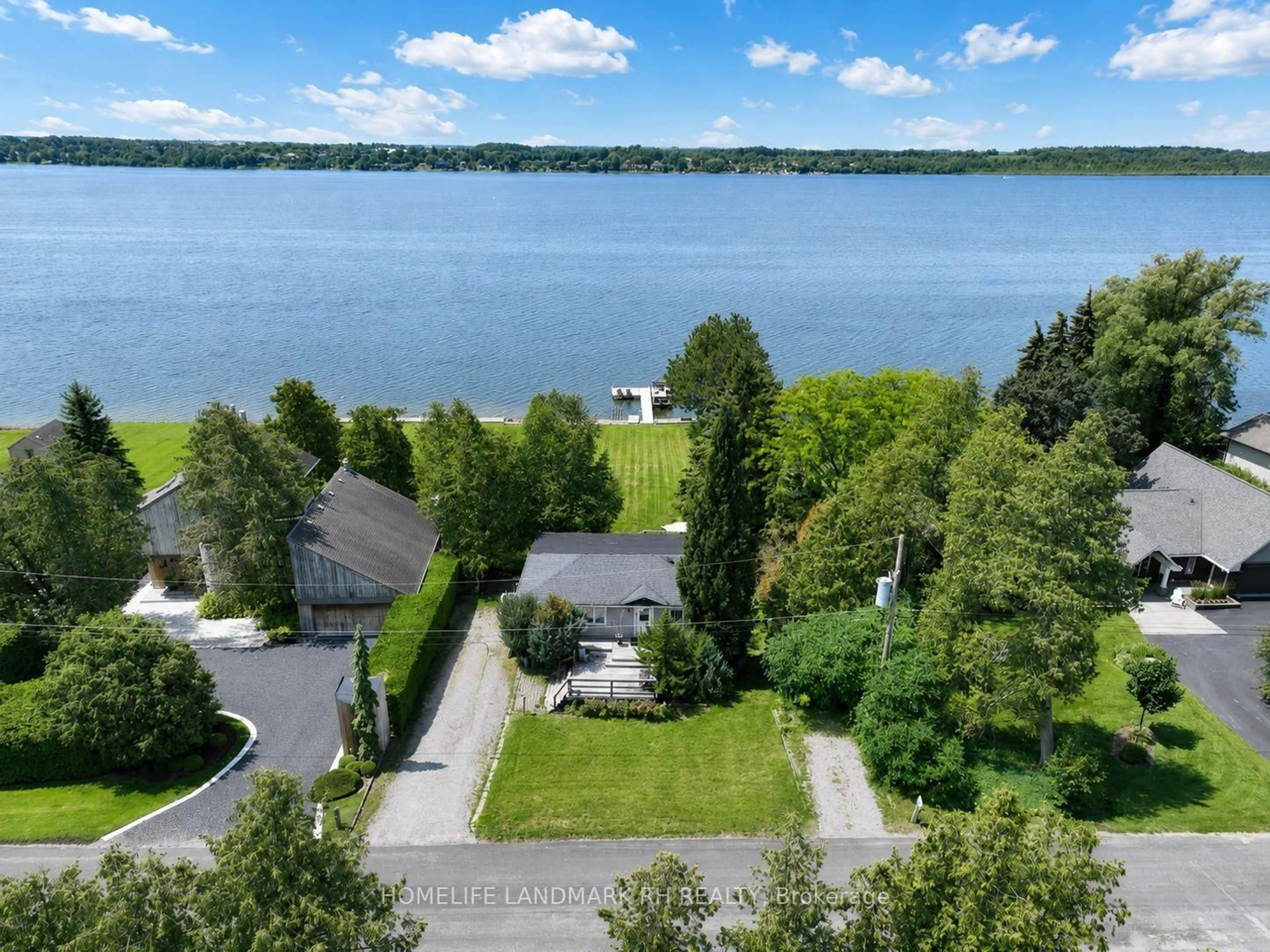 A pic from outside/outdoor area/front of a property/back of a property/a pic from drone, water/lake/river/ocean view for 186 Spring Blvd, Scugog Ontario L9L 1B4