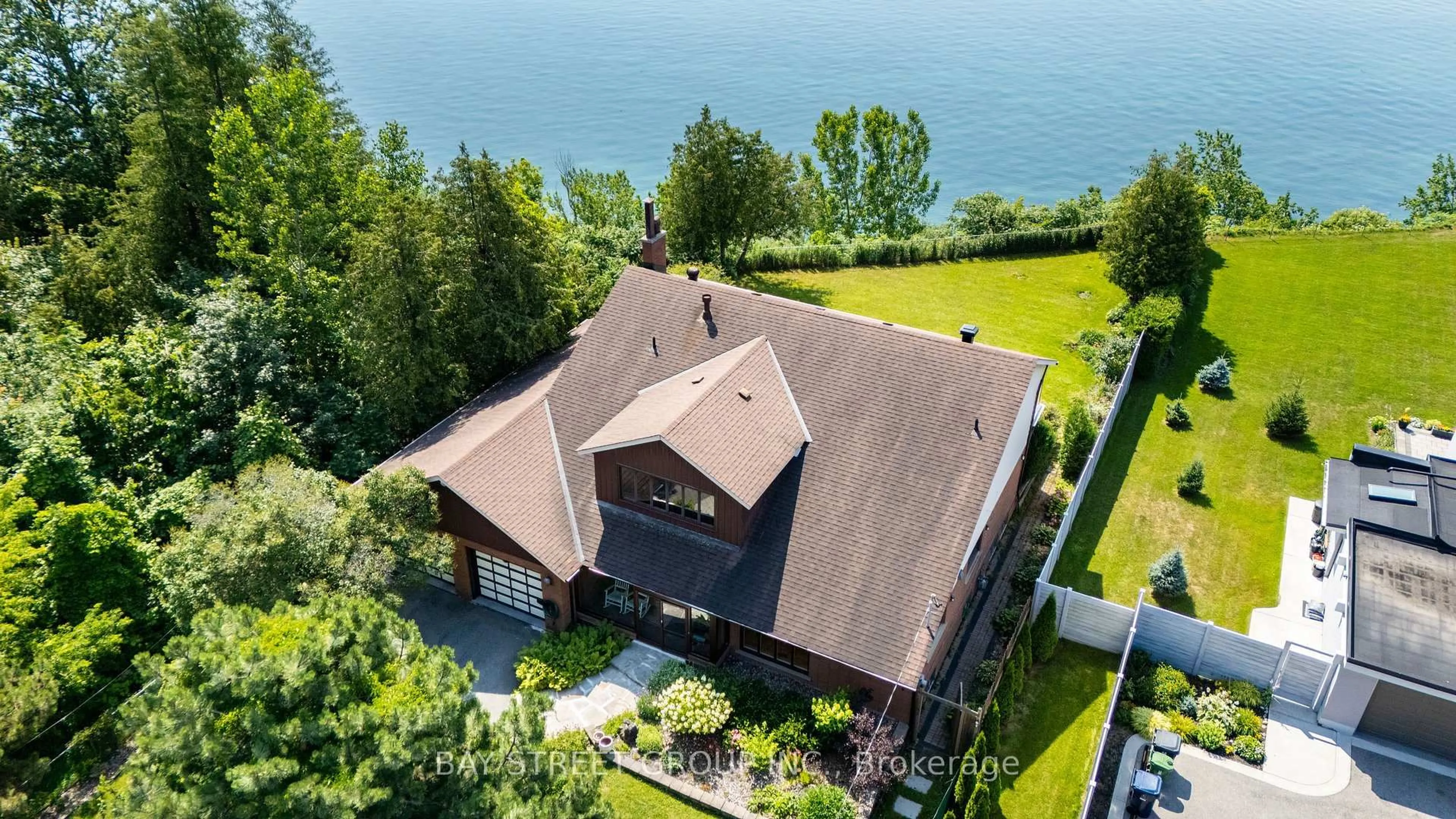 A pic from outside/outdoor area/front of a property/back of a property/a pic from drone, water/lake/river/ocean view for 441 Guildwood Pkwy, Toronto Ontario M1E 1R3