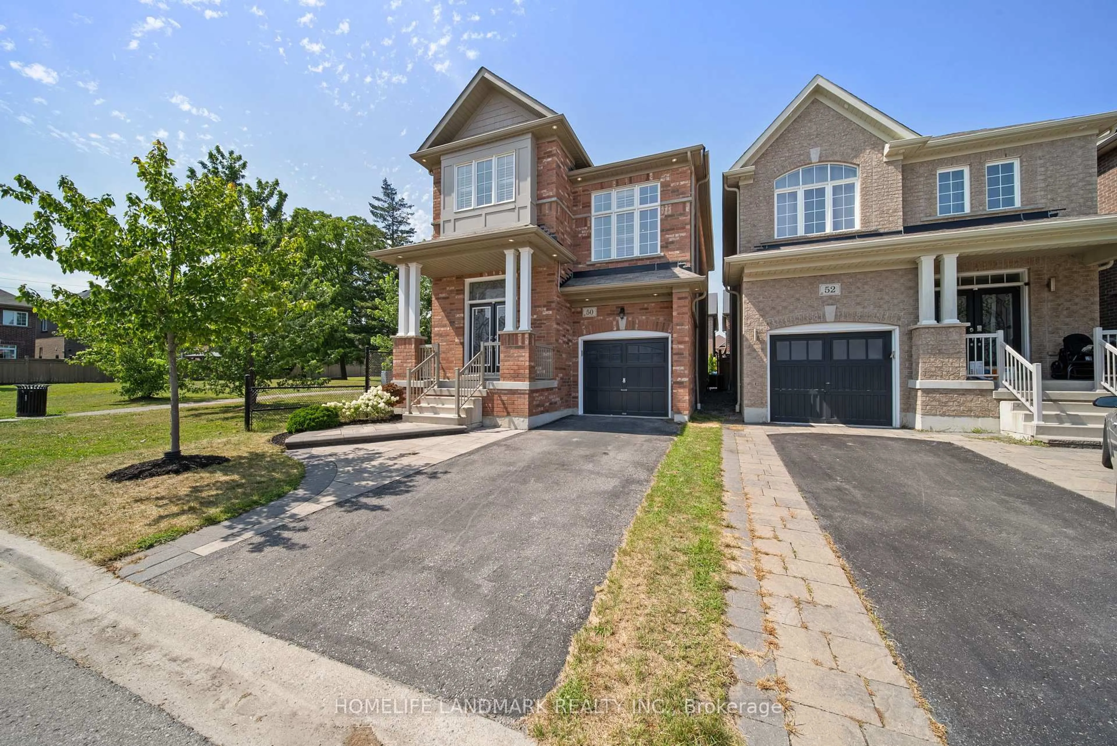 Home with brick exterior material, street for 50 Keith-Wright Cres, Ajax Ontario L1Z 0P9