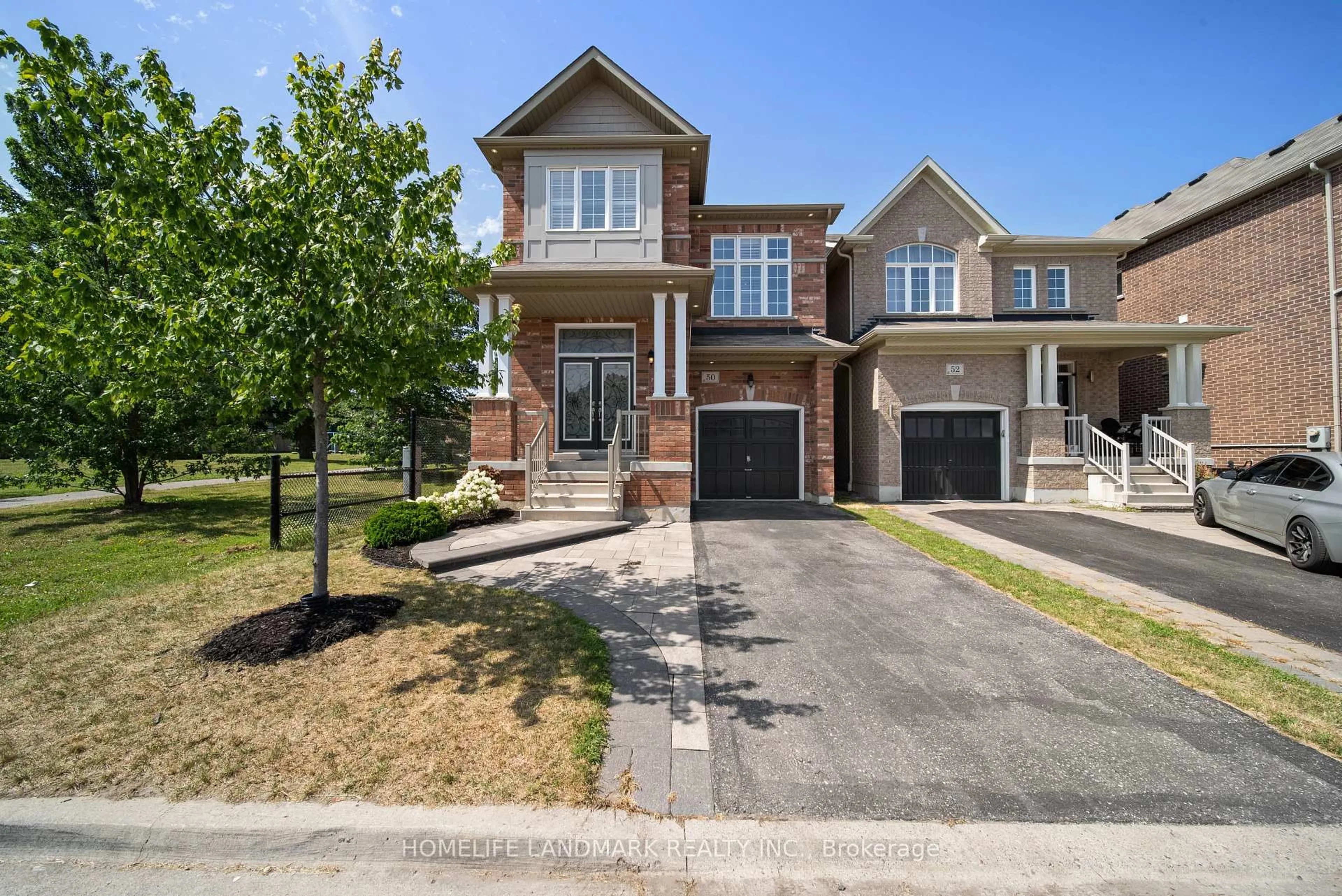 Home with brick exterior material, street for 50 Keith-Wright Cres, Ajax Ontario L1Z 0P9