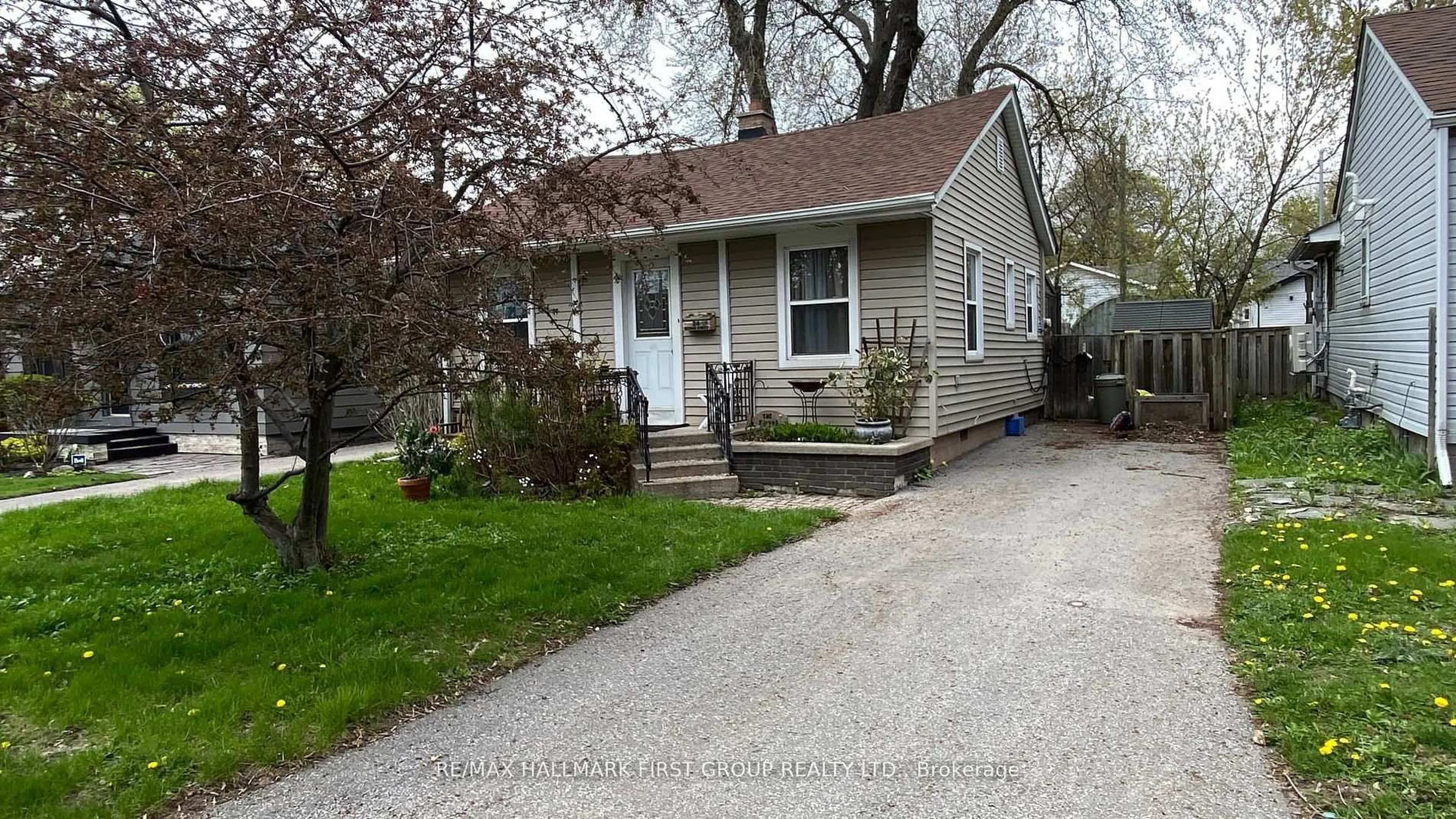 Home with vinyl exterior material, street for 24 George St, Ajax Ontario L1S 1S5