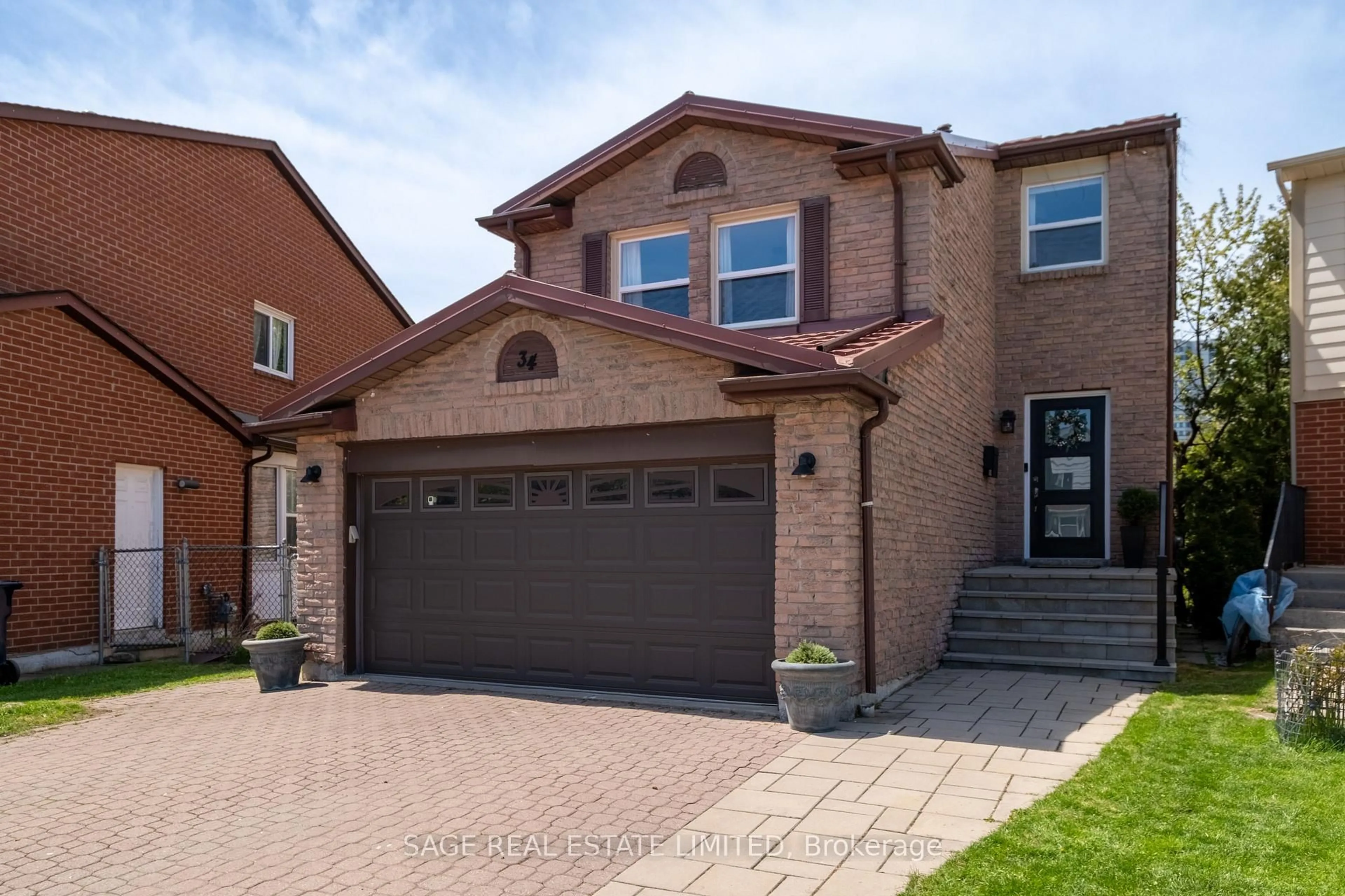 Home with brick exterior material, street for 34 Tambrook Dr, Toronto Ontario M1W 3L9