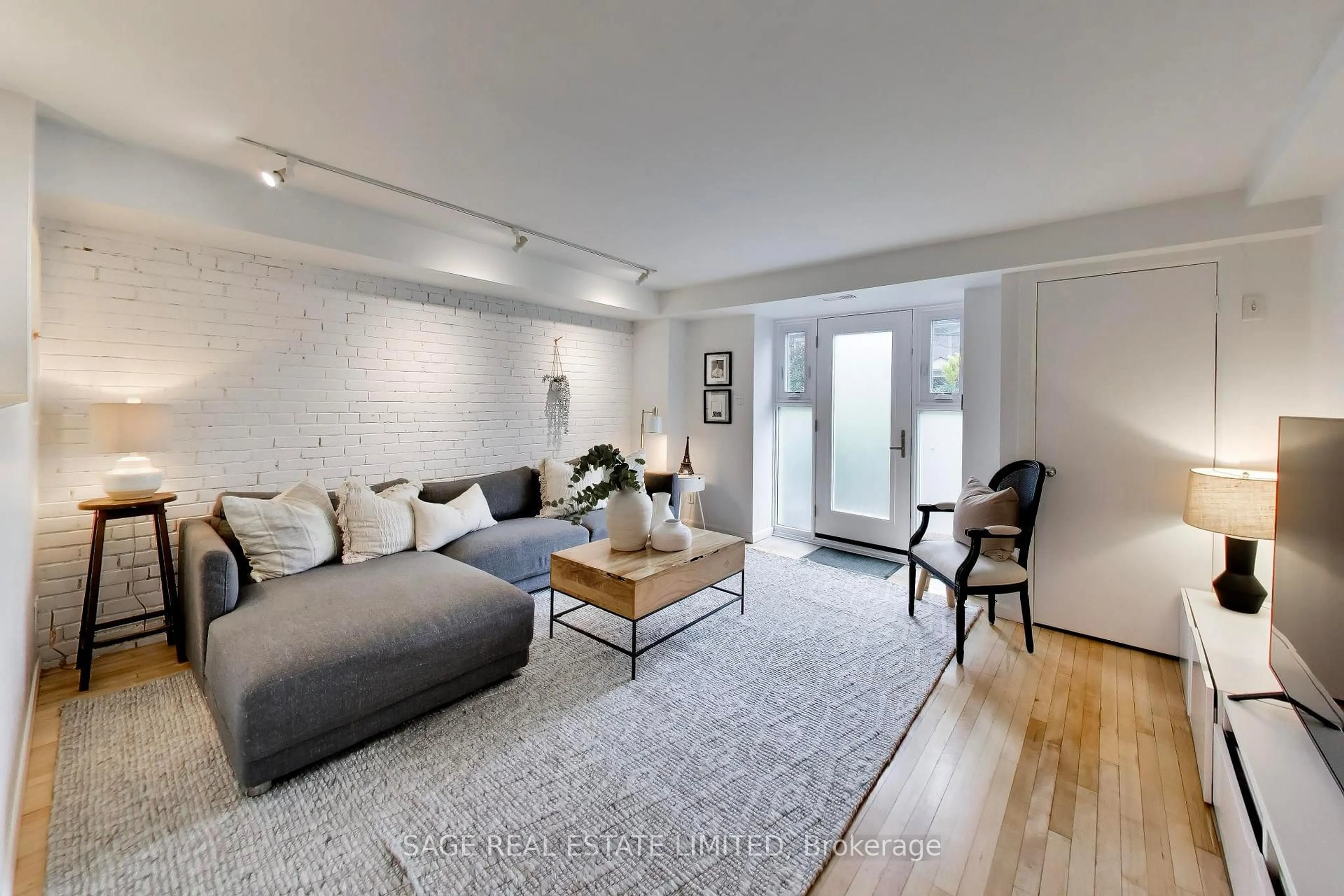 Living room with furniture, unknown for 660 Pape Ave #111, Toronto Ontario M4K 3S5
