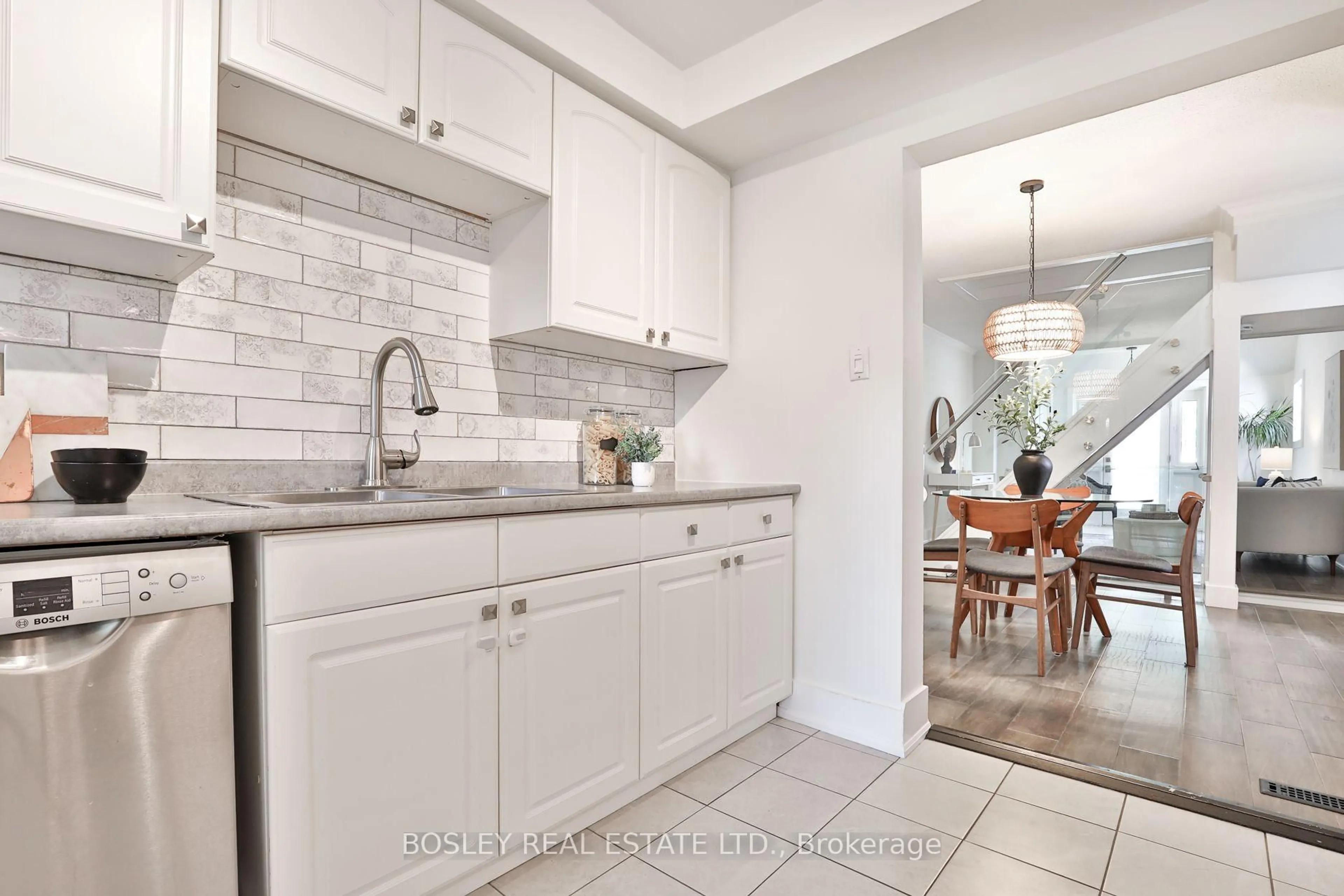 Open concept kitchen, ceramic/tile floor for 373 Sammon Ave, Toronto Ontario M4J 2A6