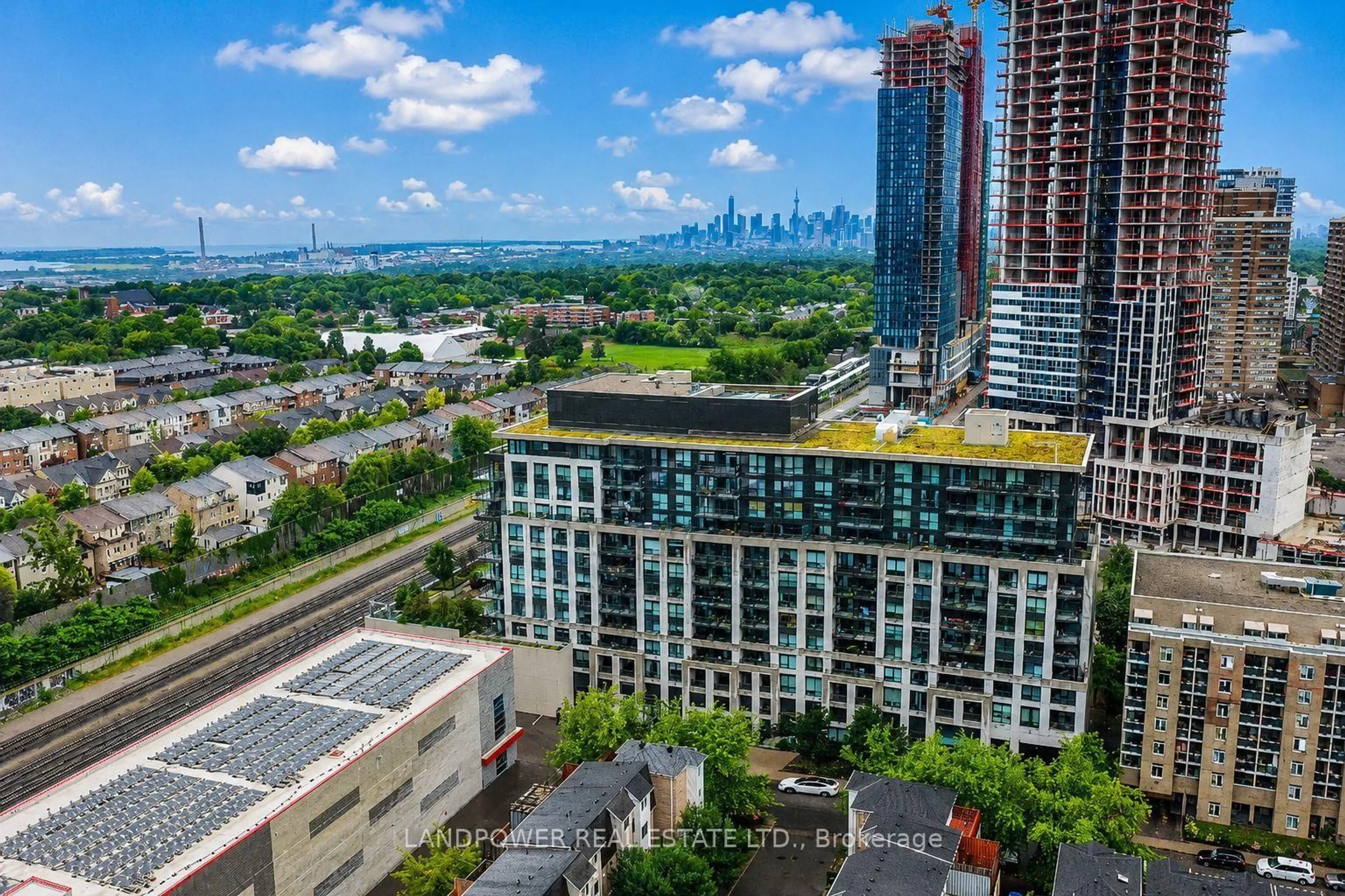 A pic from outside/outdoor area/front of a property/back of a property/a pic from drone, city buildings view from balcony for 8 Trent Ave #824, Toronto Ontario M4C 5C6