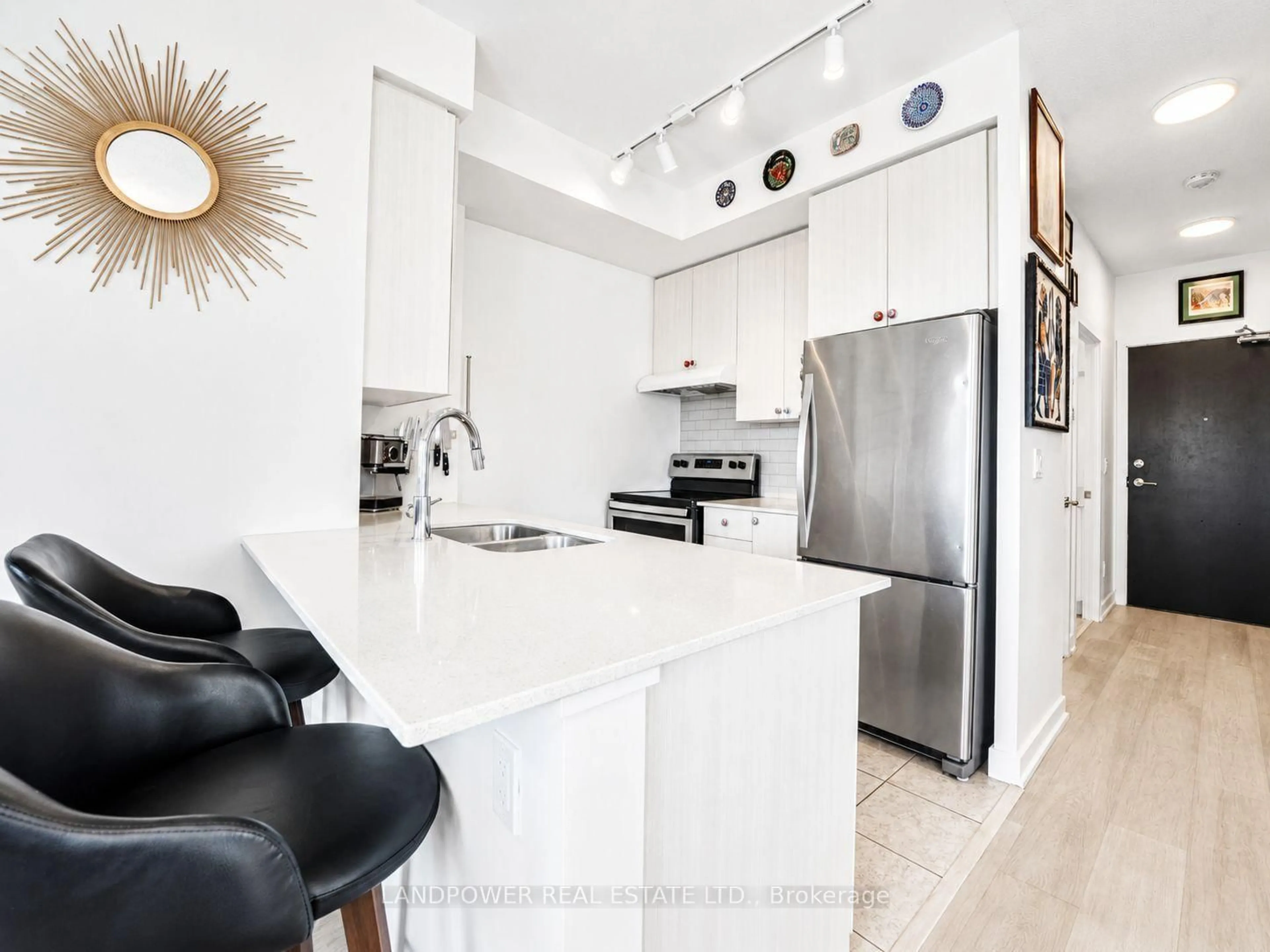 Open concept kitchen, ceramic/tile floor for 8 Trent Ave #824, Toronto Ontario M4C 5C6