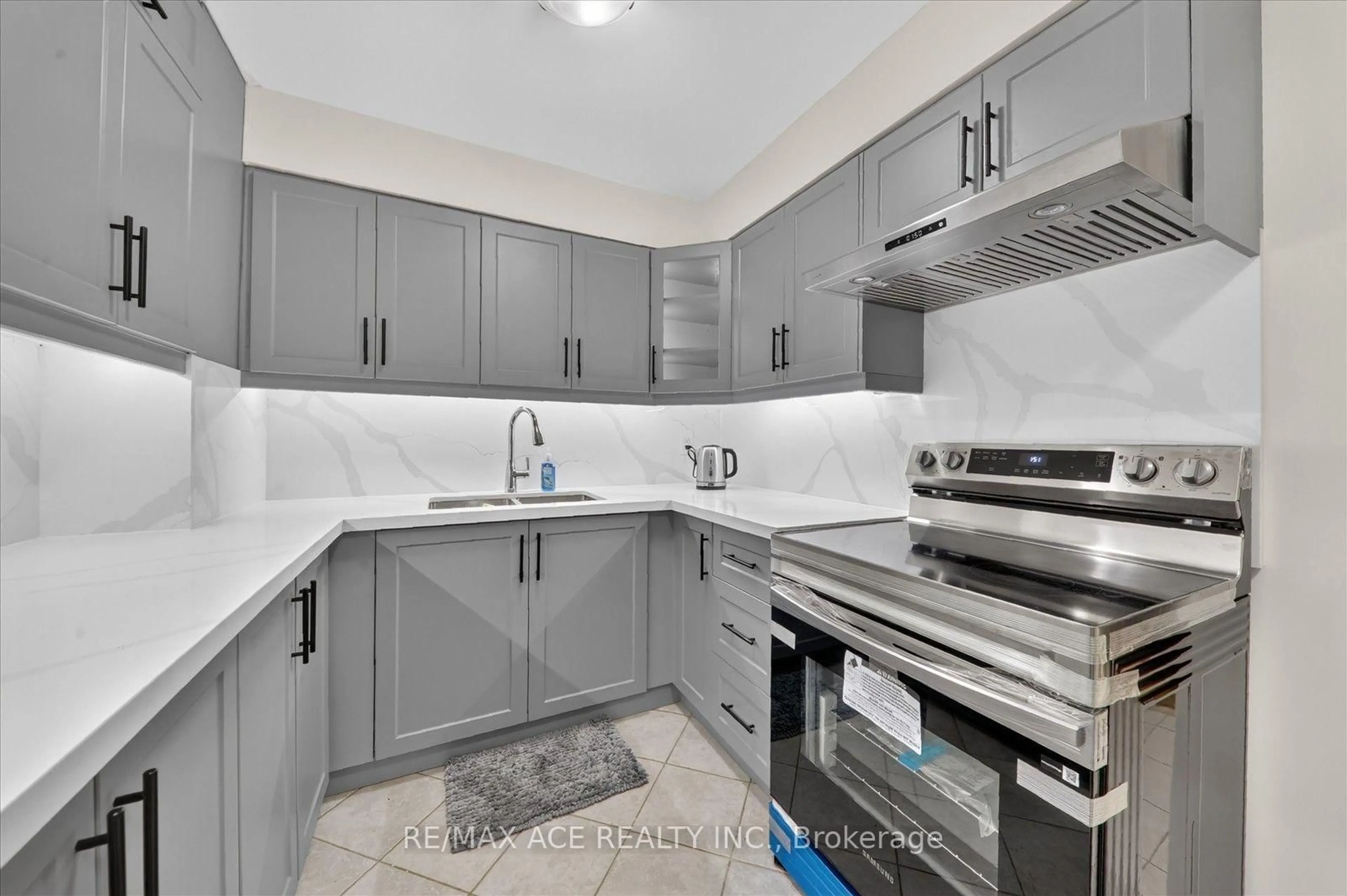 Standard kitchen, ceramic/tile floor for 15 Sewells Rd #201, Toronto Ontario M1B 3V7