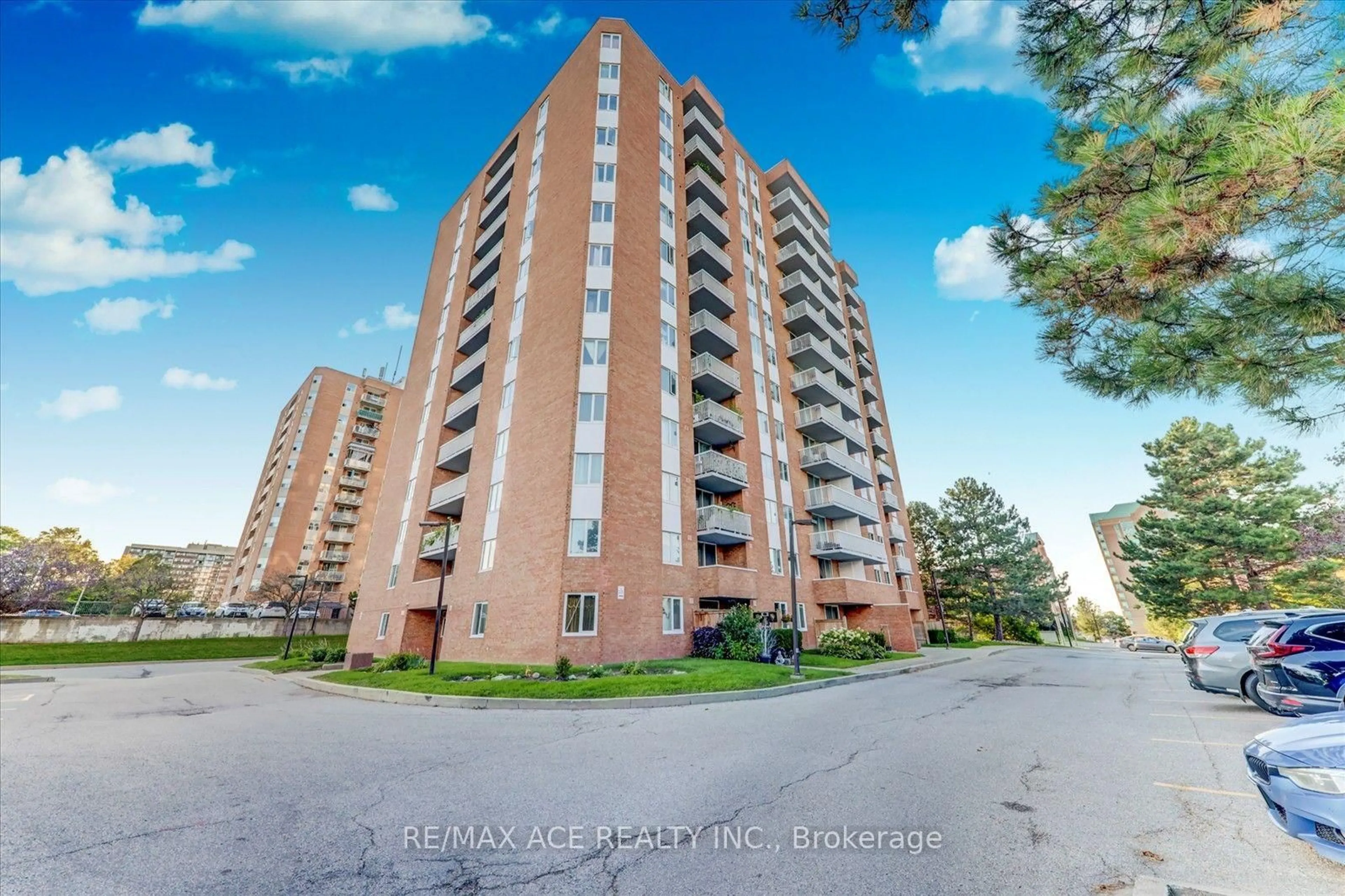 A pic from outside/outdoor area/front of a property/back of a property/a pic from drone, unknown for 15 Sewells Rd #201, Toronto Ontario M1B 3V7