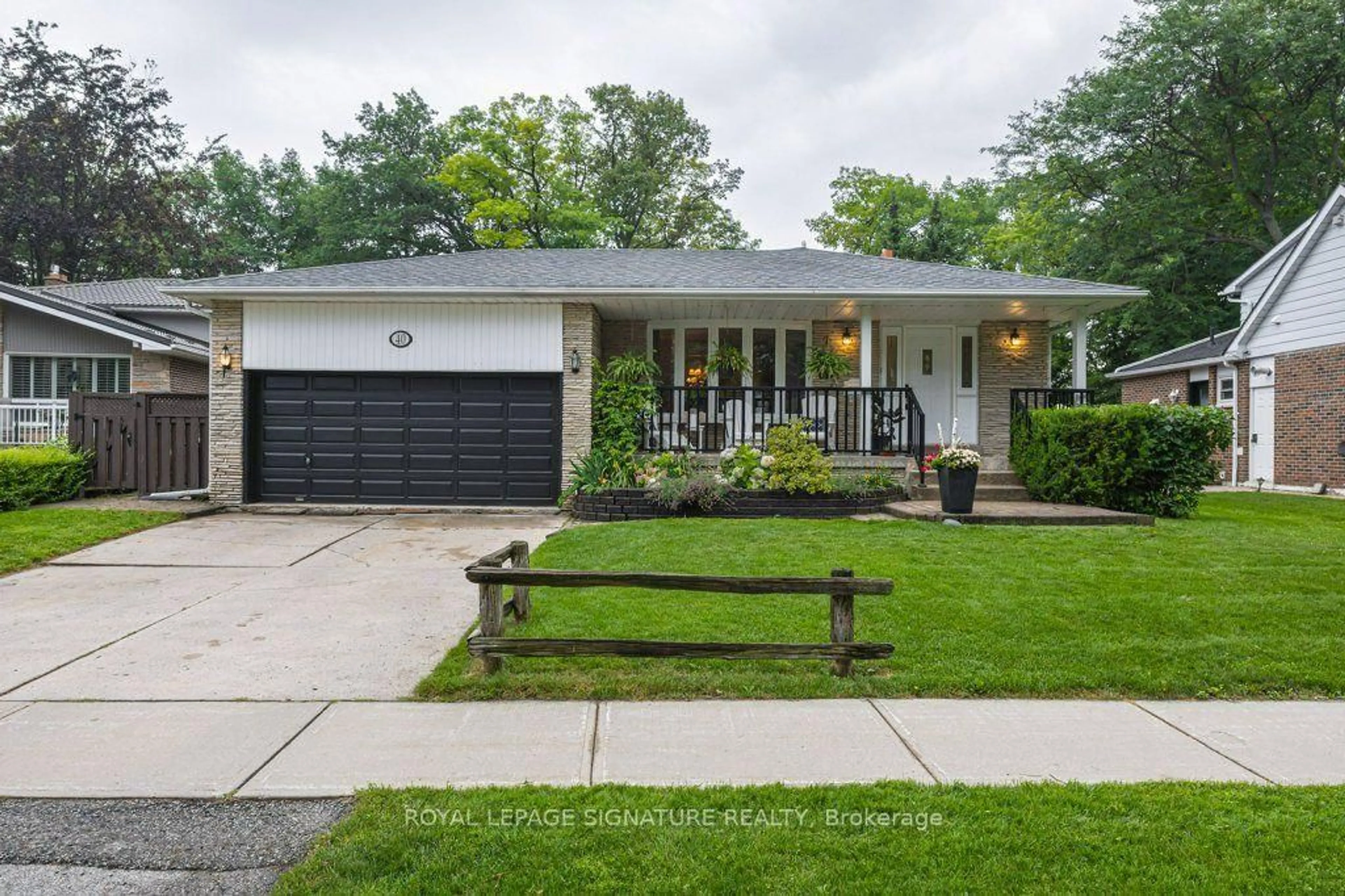 Home with brick exterior material, street for 40 Holmcrest Tr, Toronto Ontario M1C 1V5