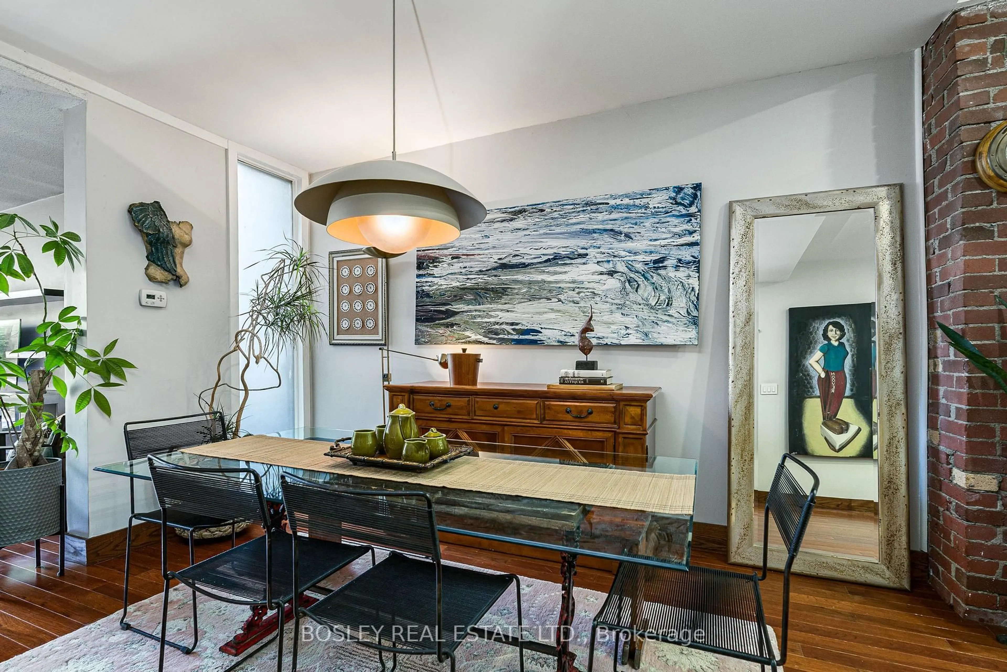 Dining room, wood/laminate floor for 16 Blong Ave, Toronto Ontario M4M 1P2
