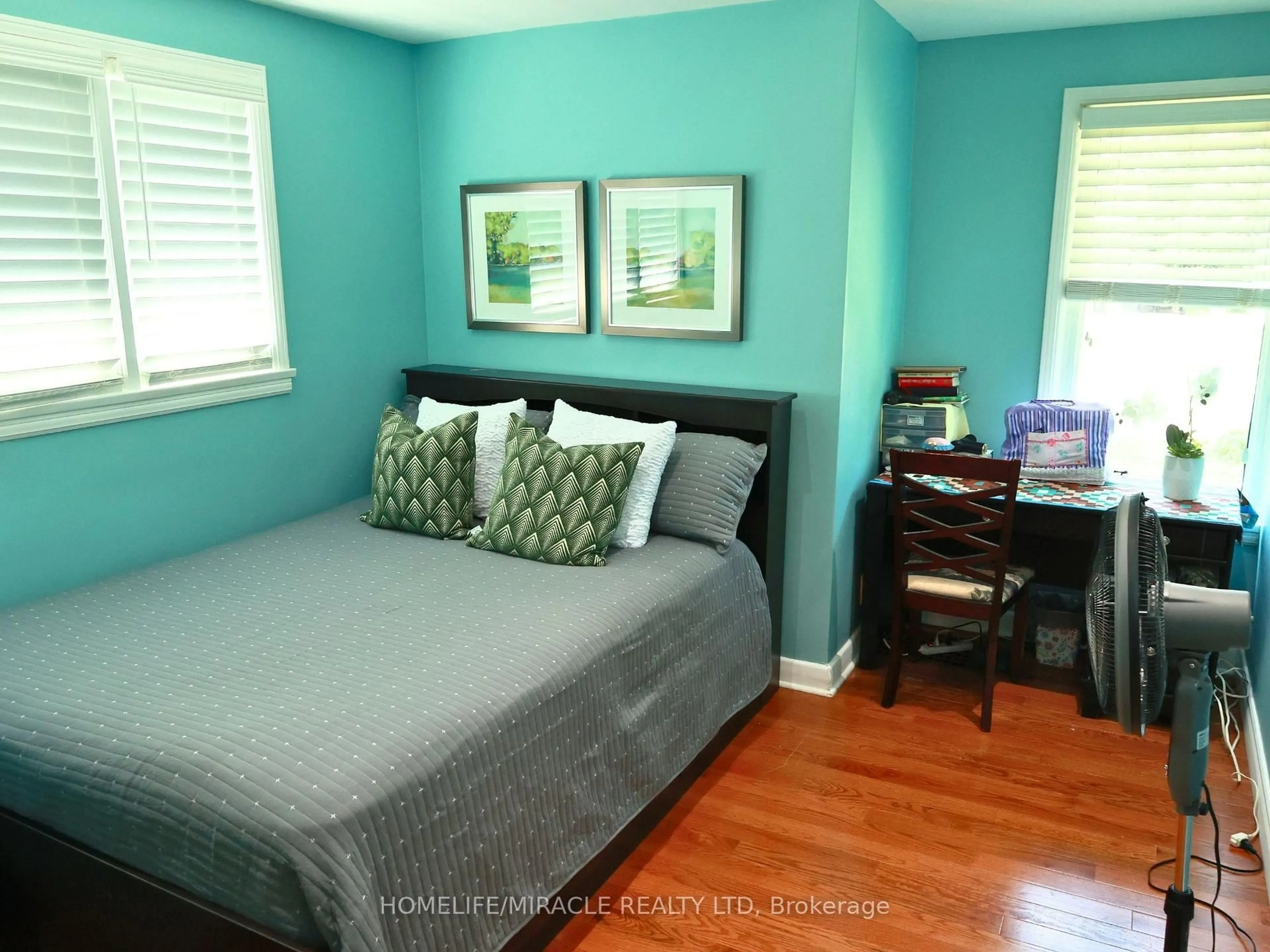 Bedroom with bed, wood/laminate floor for 113 Pontiac Ave, Oshawa Ontario L1G 3M1