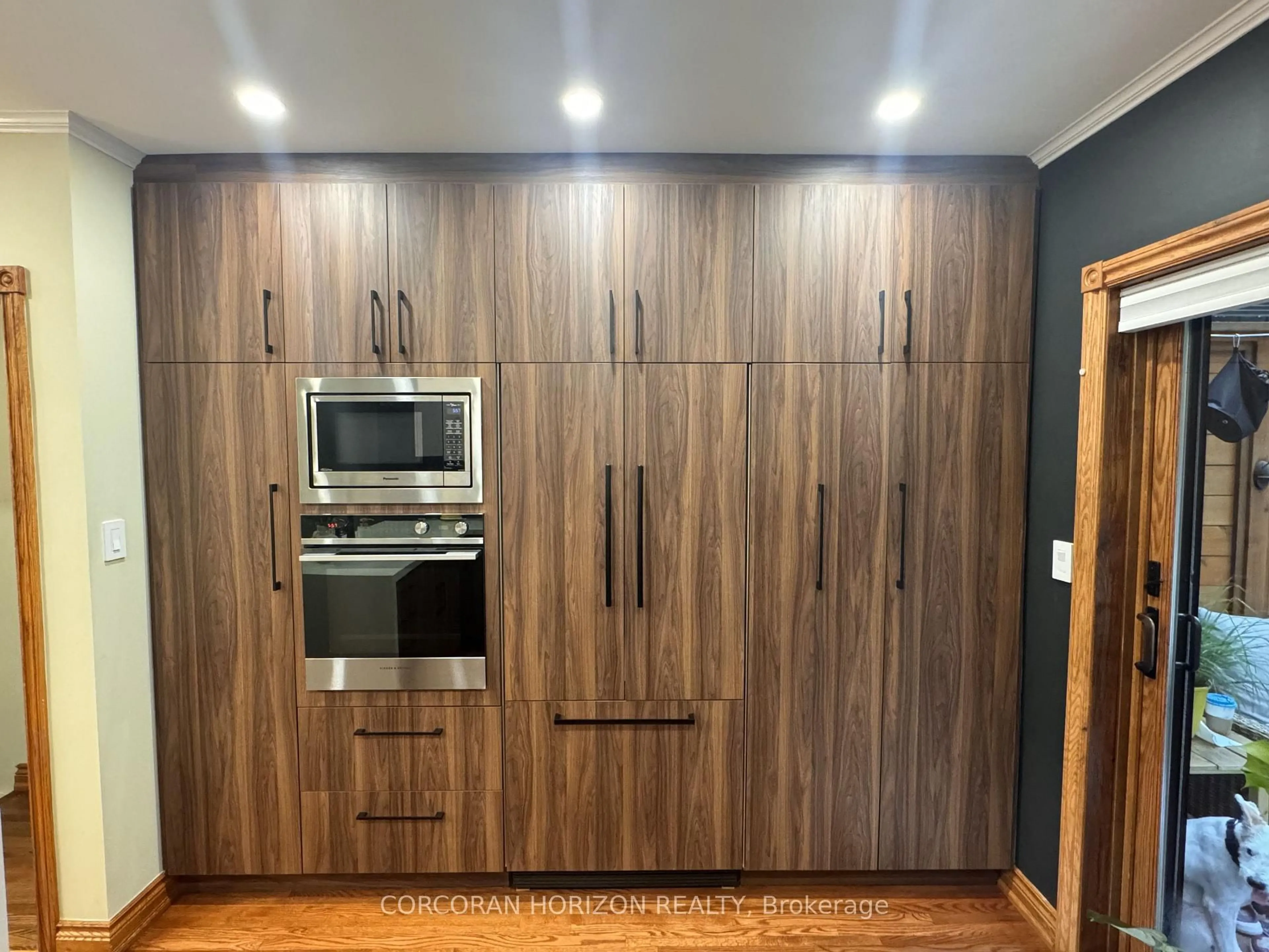 Standard kitchen, wood/laminate floor for 402 Rhodes Ave, Toronto Ontario M4L 3A5