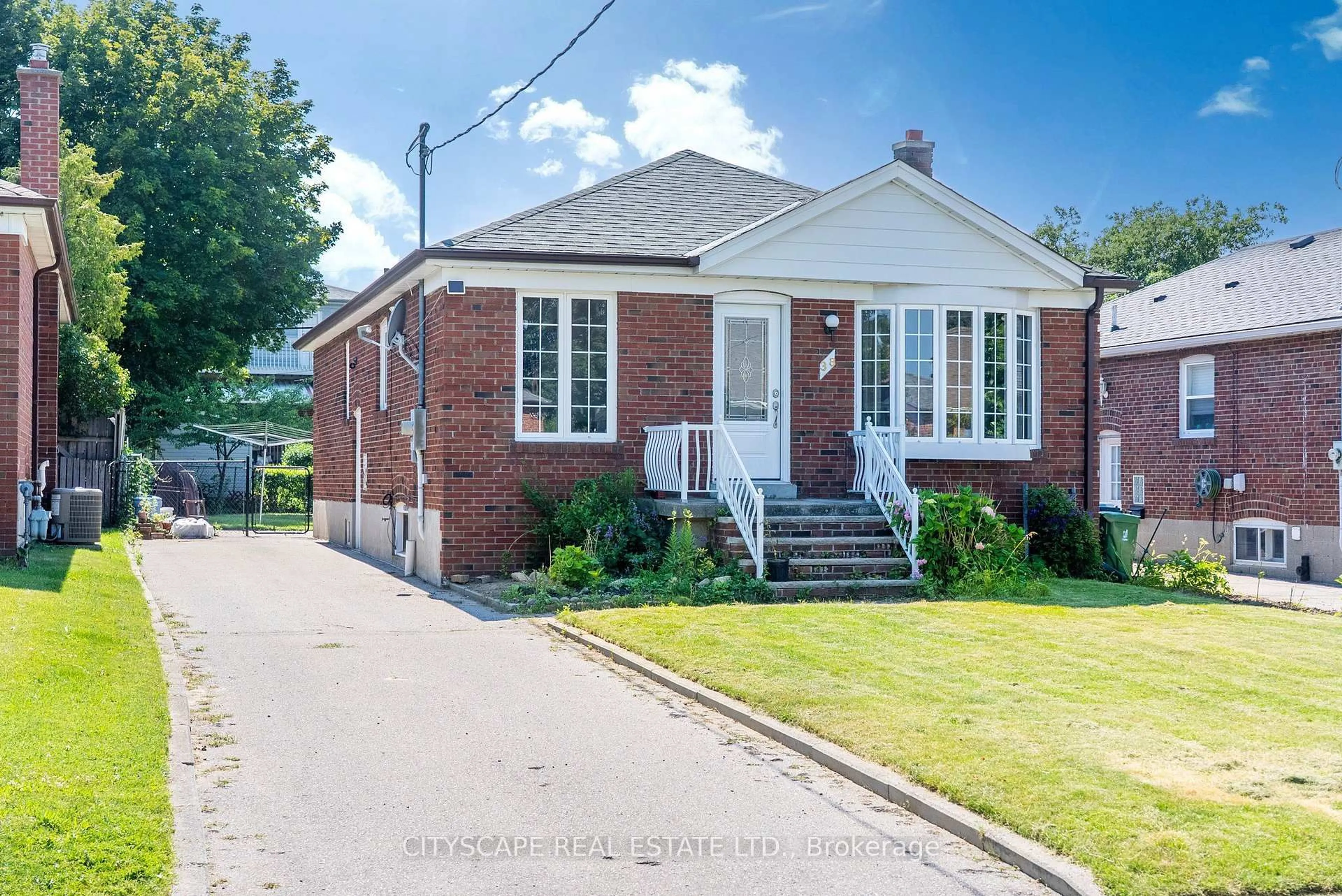 Home with brick exterior material, street for 38 Marta Ave, Toronto Ontario M1K 1V7