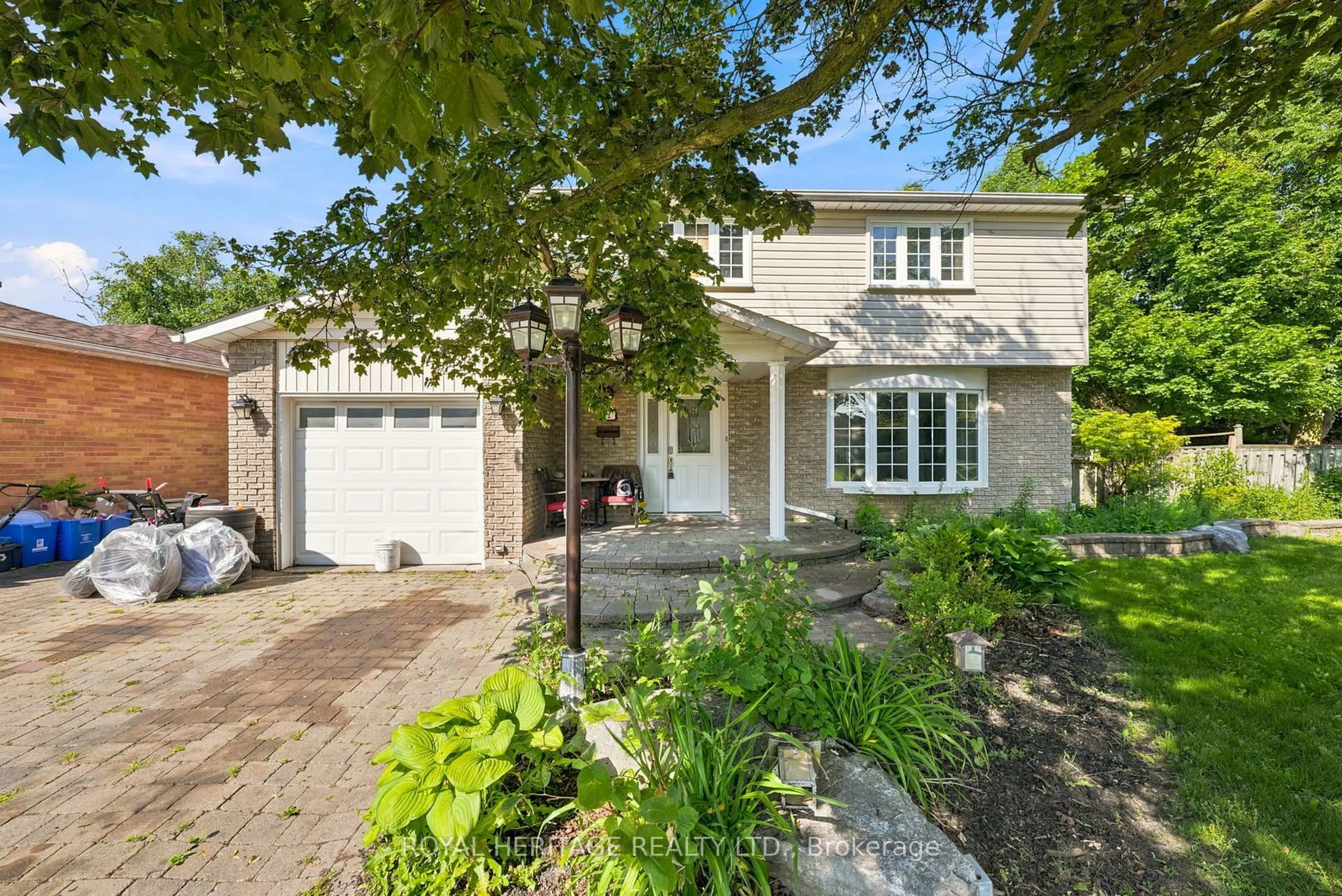 Home with brick exterior material, street for 2 Belton Crt, Whitby Ontario L1N 5P1