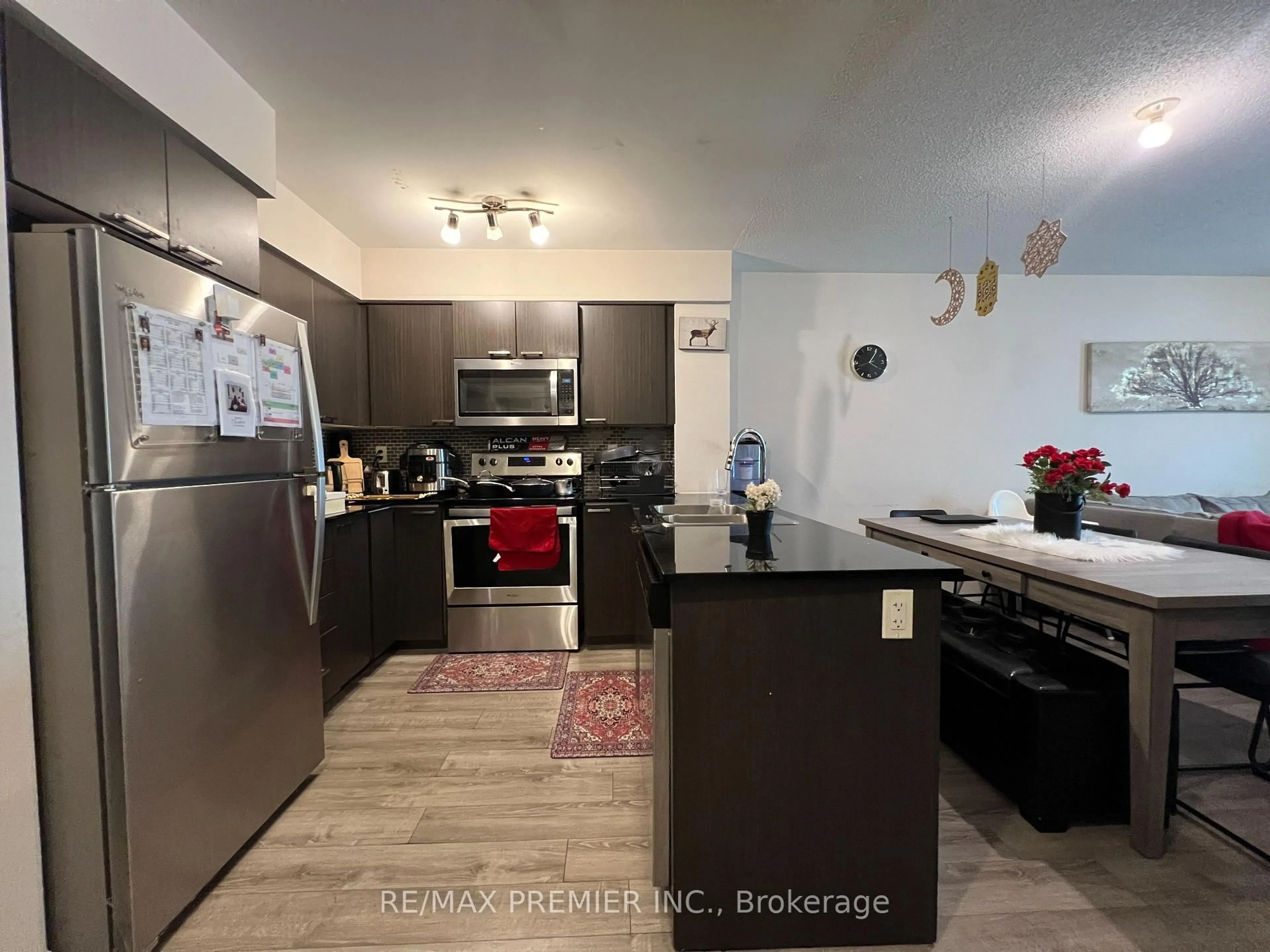 Open concept kitchen, unknown for 2150 Lawrence Ave #PH12, Toronto Ontario M1R 3A7
