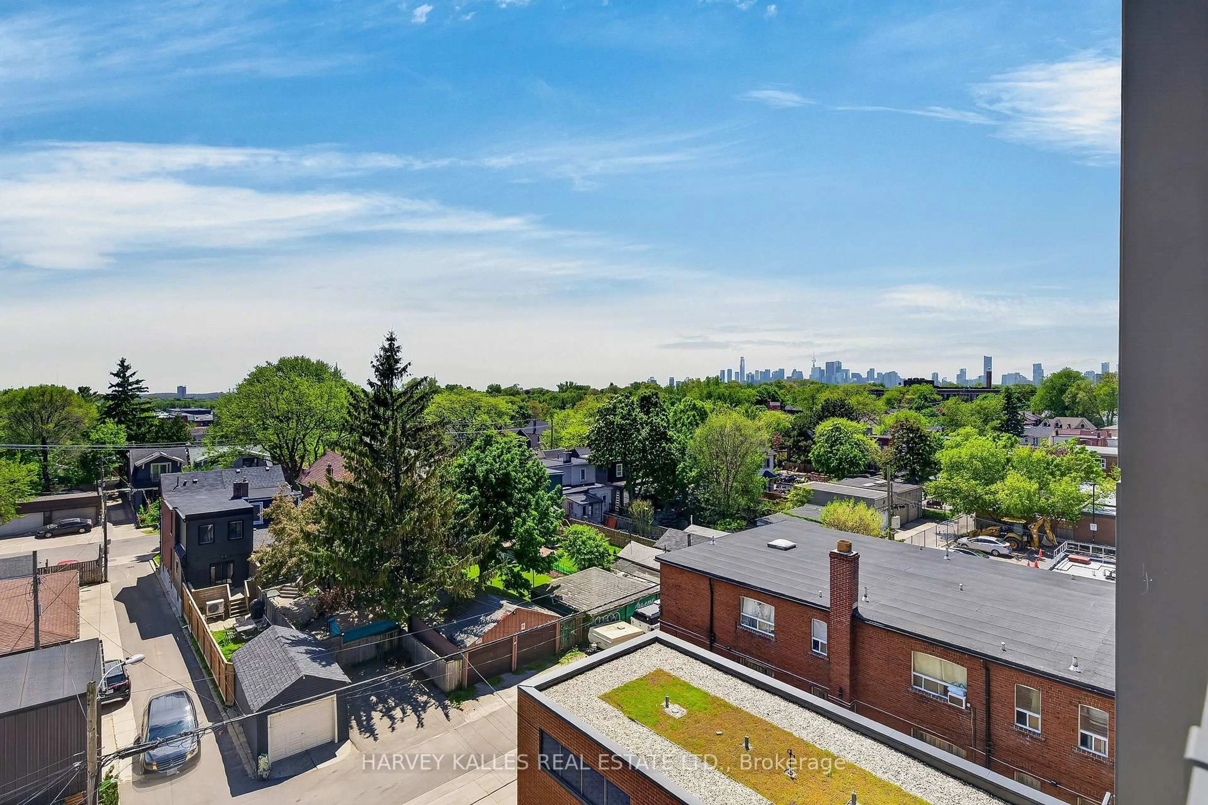 A pic from outside/outdoor area/front of a property/back of a property/a pic from drone, city buildings view from balcony for 630 Greenwood Ave #503, Toronto Ontario M4J 0A8