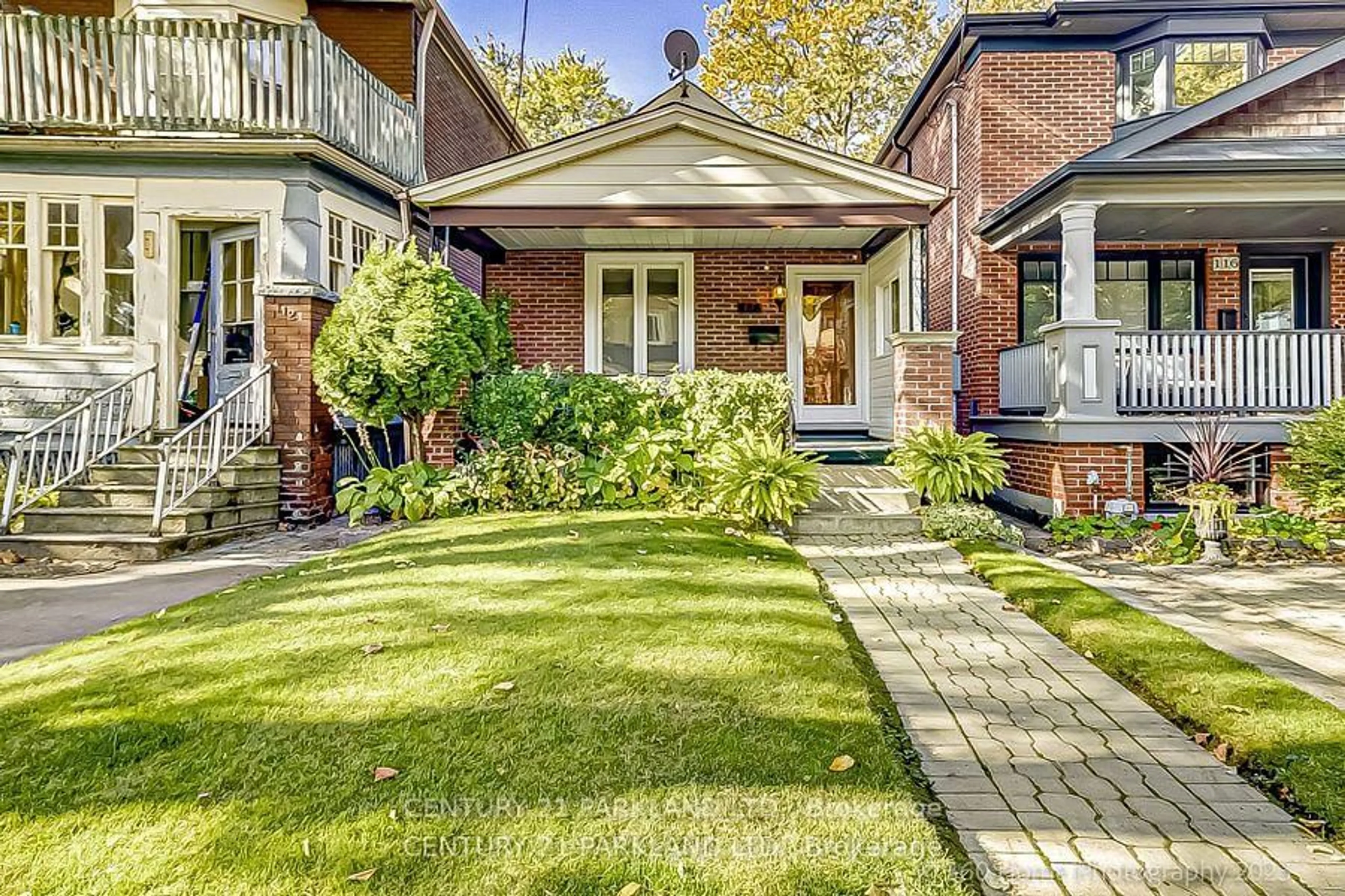 Home with brick exterior material, street for 114 Eaton Ave, Toronto Ontario M4J 2Z7