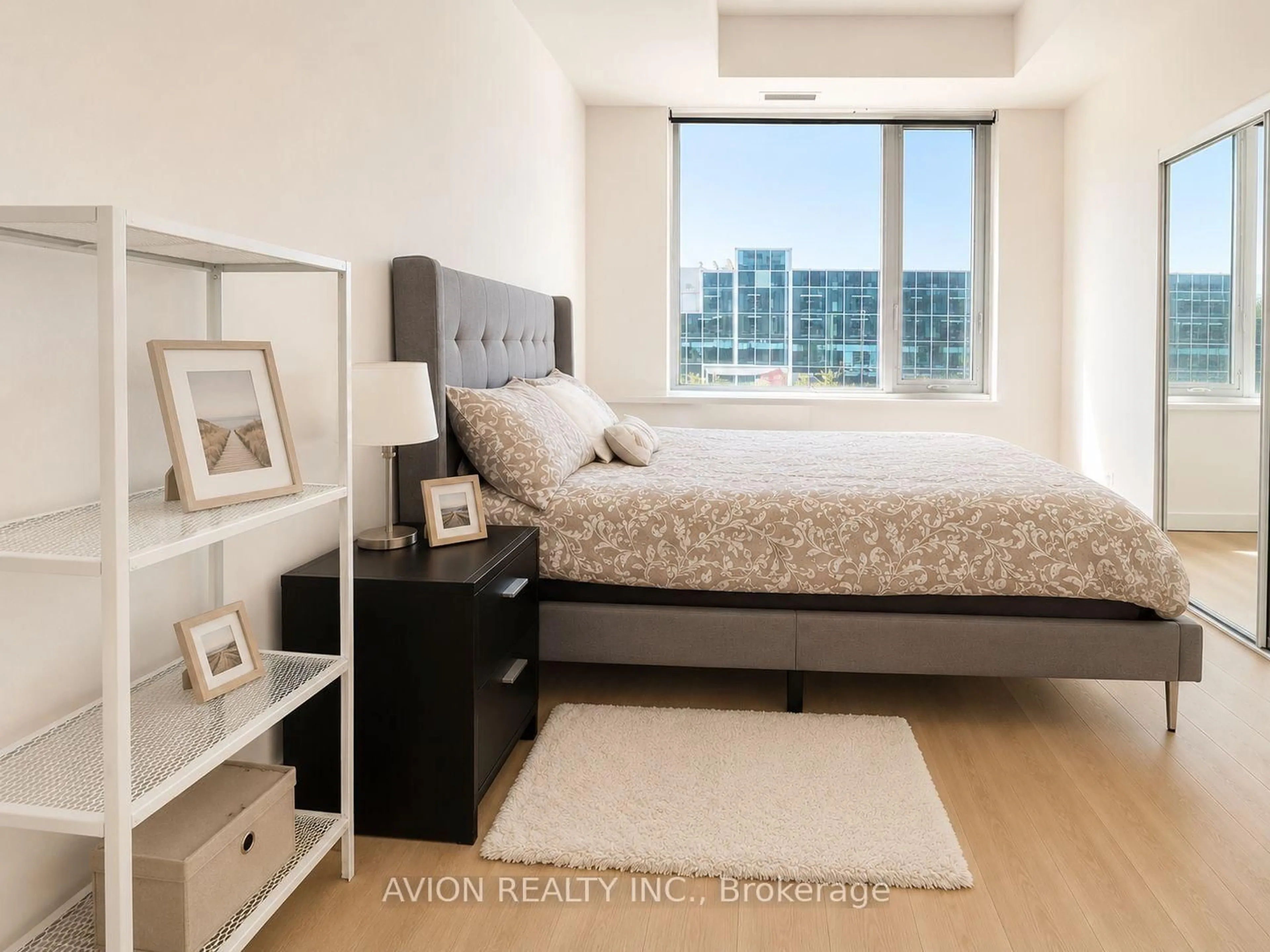 Bedroom with bed, wood/laminate floor for 3220 Sheppard Ave #212, Toronto Ontario M1T 3K3