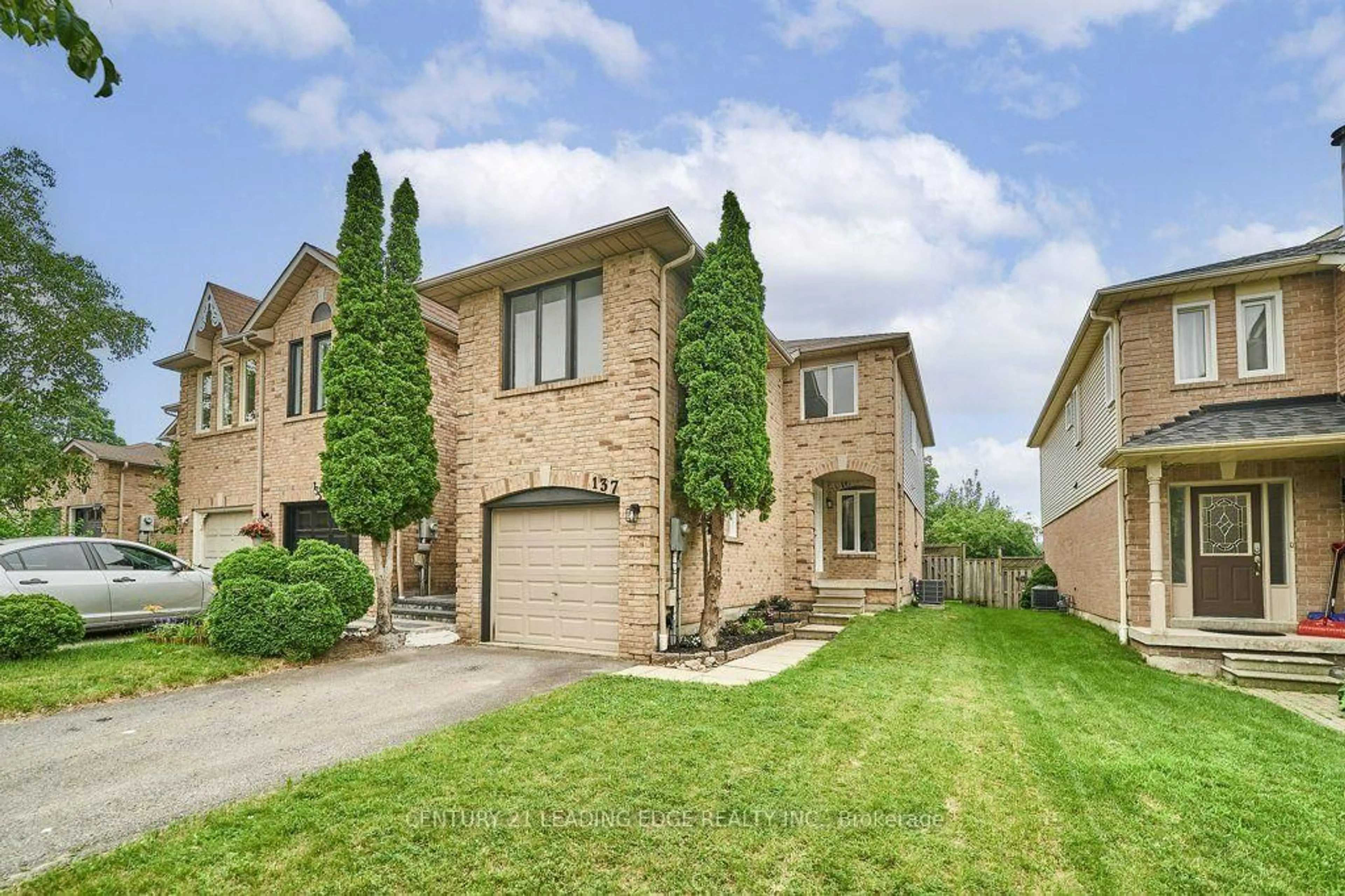 Home with brick exterior material, street for 137 Timber Mill Ave, Whitby Ontario L1R 2H3