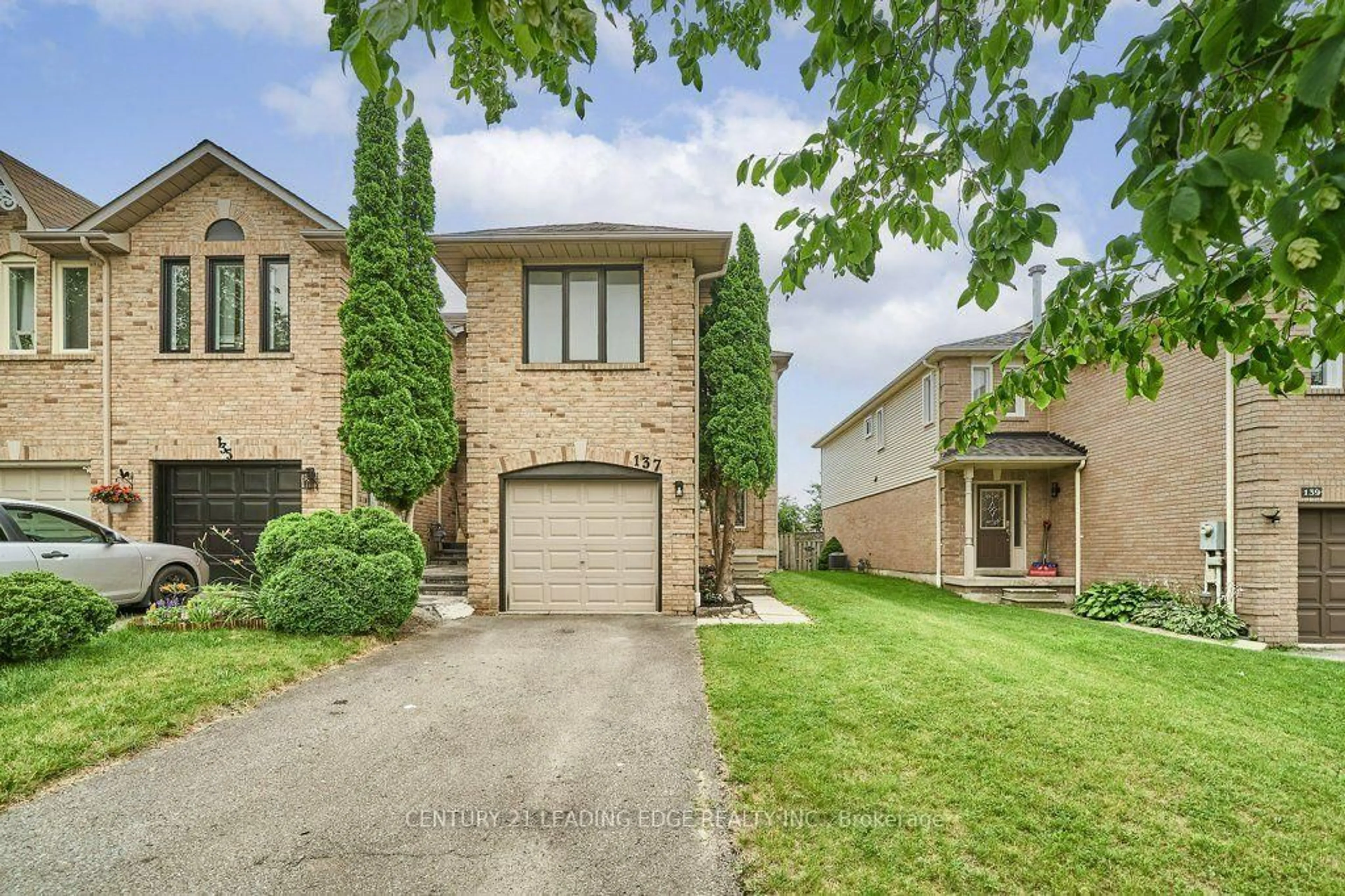 Home with brick exterior material, street for 137 Timber Mill Ave, Whitby Ontario L1R 2H3