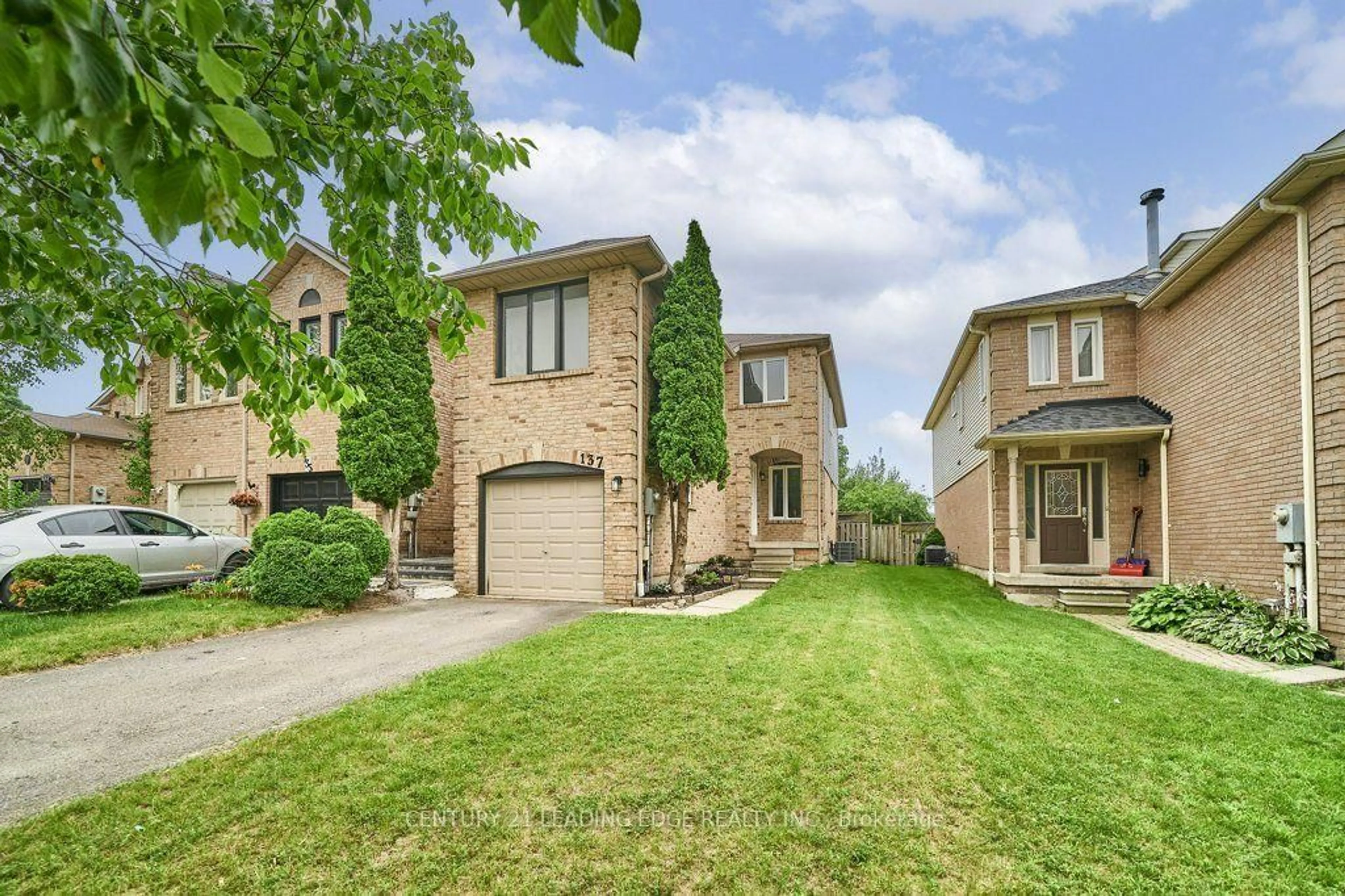 Home with brick exterior material, street for 137 Timber Mill Ave, Whitby Ontario L1R 2H3