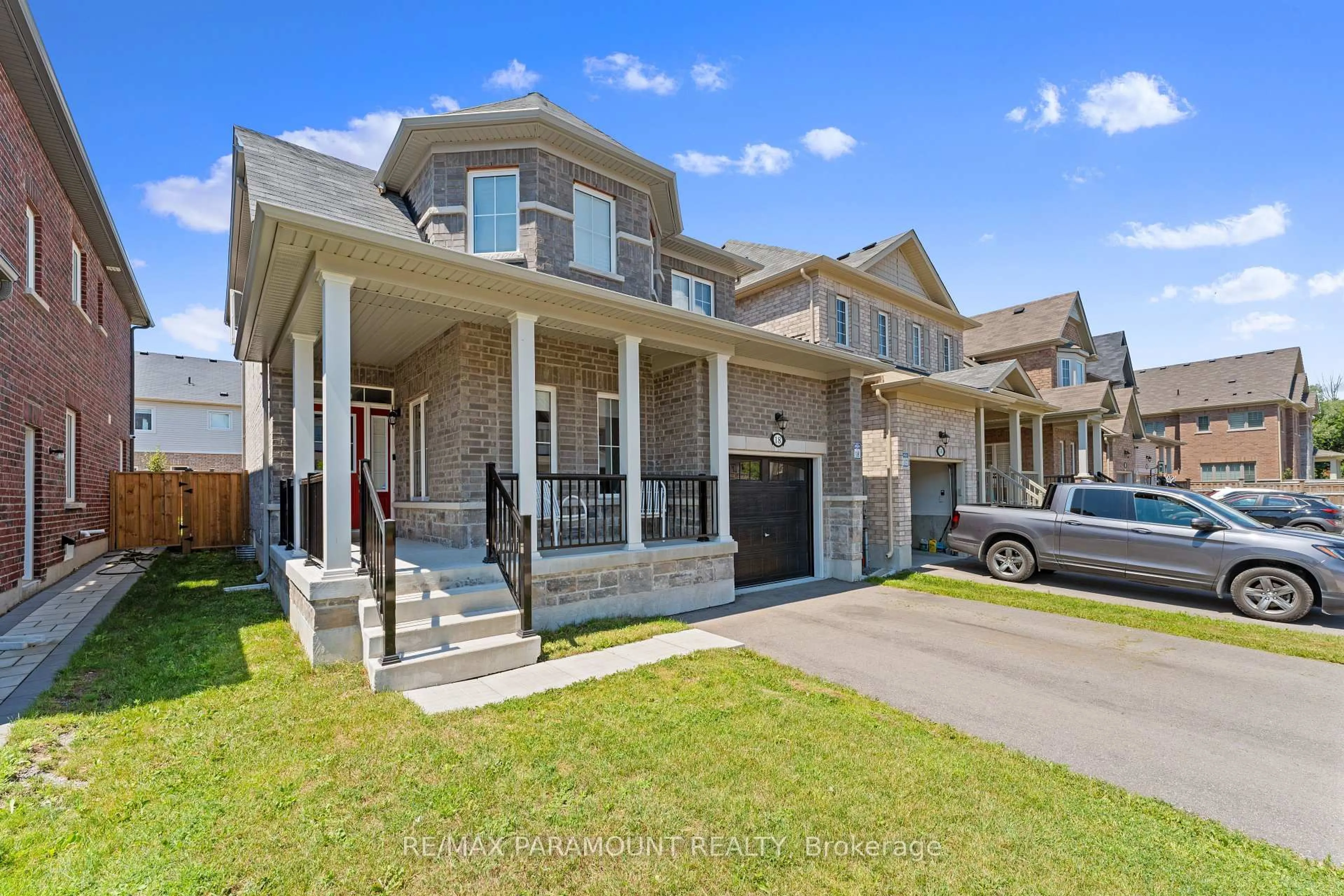 Home with brick exterior material, street for 18 Tait Cres, Clarington Ontario L1C 0R8