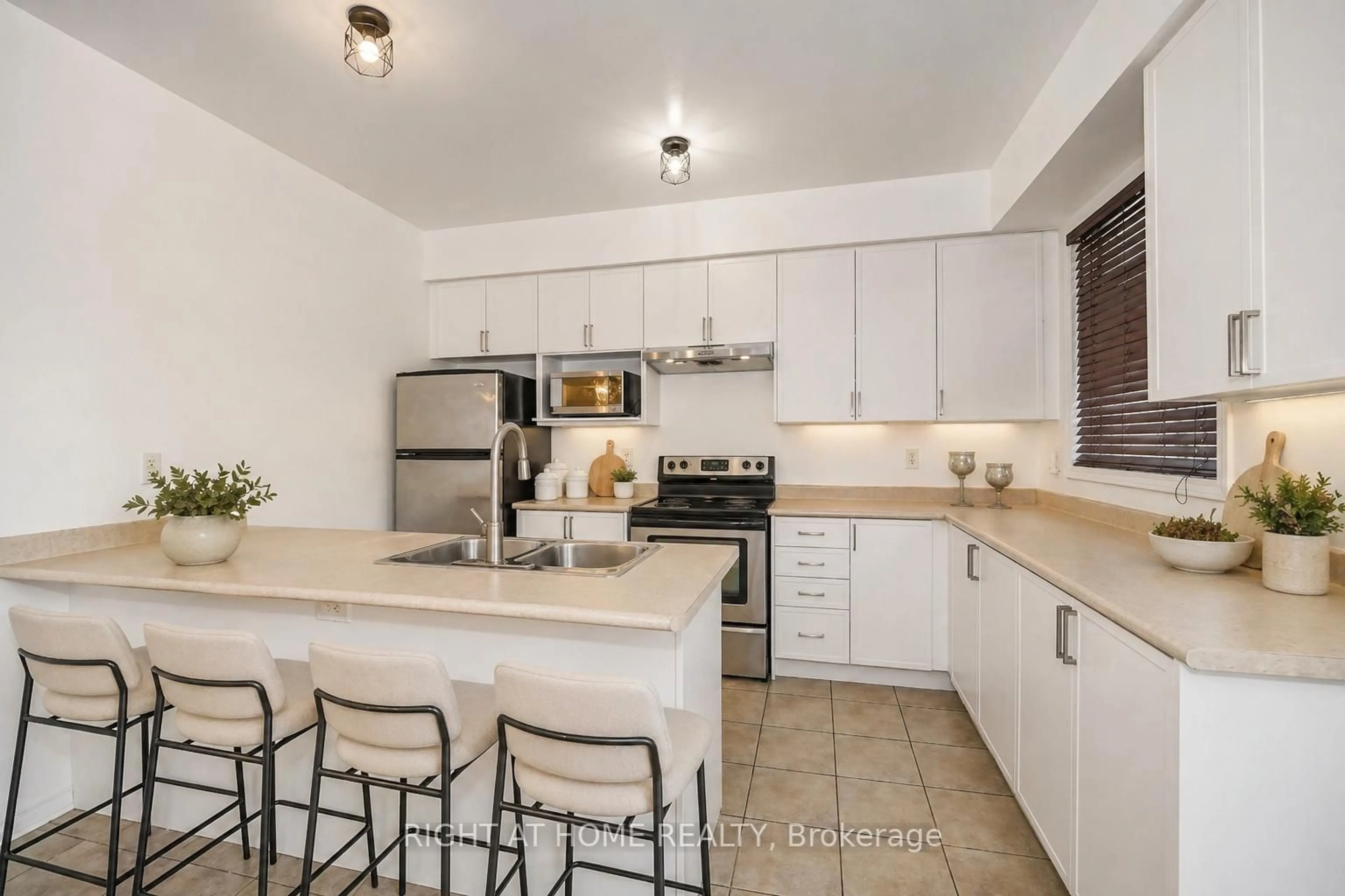 Open concept kitchen, ceramic/tile floor for 48 Curran Hall Cres, Toronto Ontario M1G 0A2