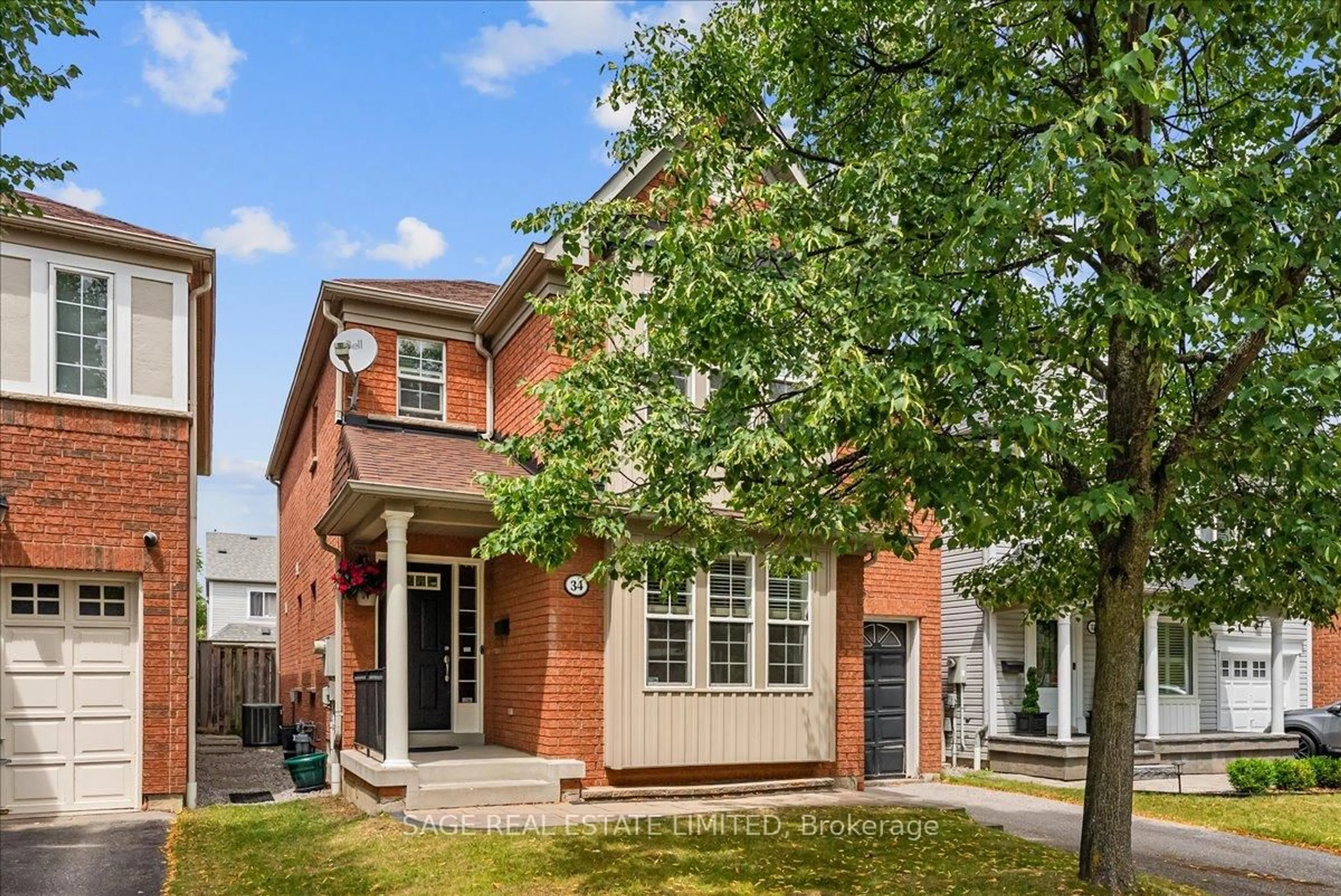 Home with brick exterior material, street for 34 Mcsweeney Cres, Ajax Ontario L1T 4C7