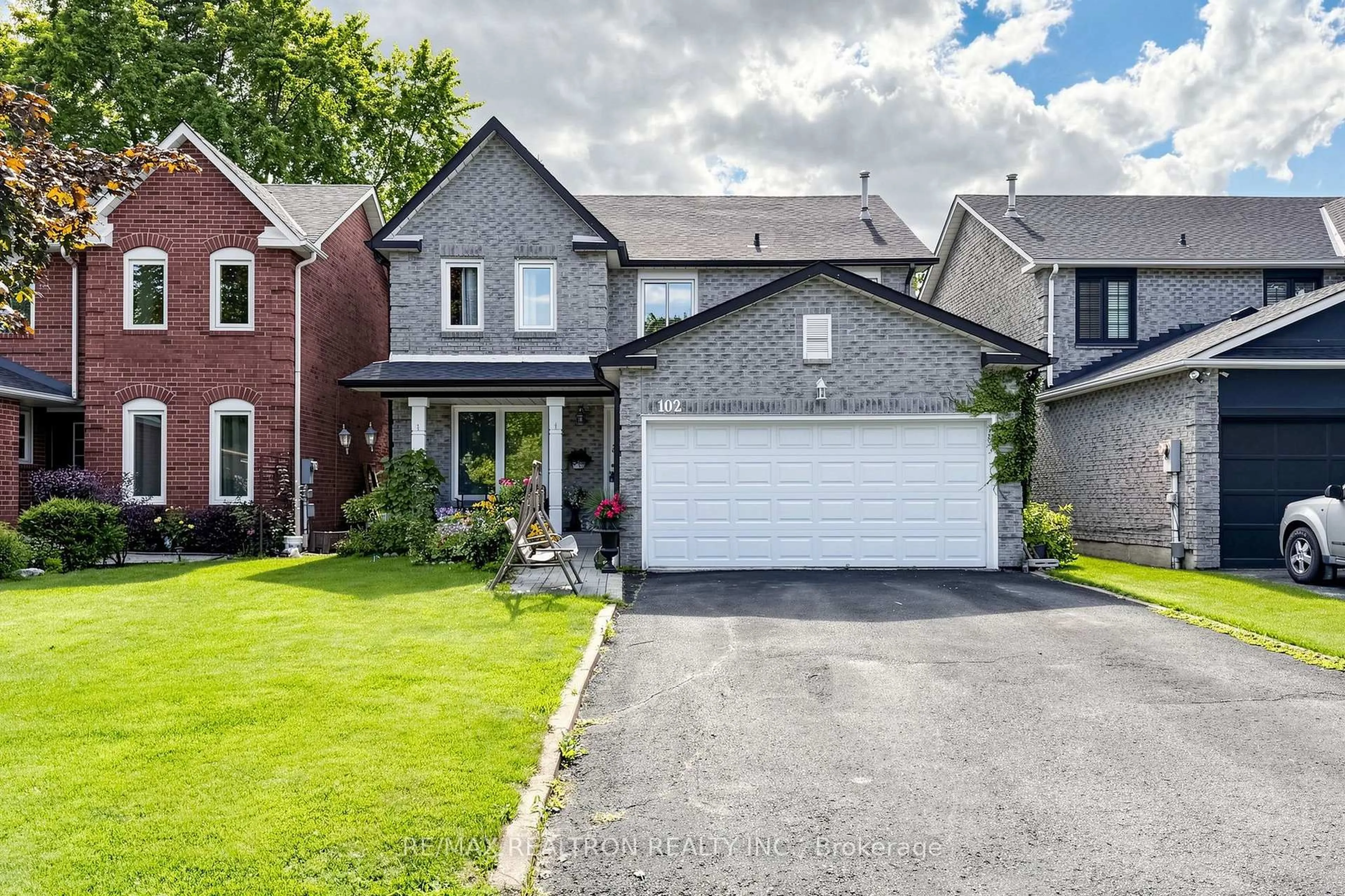 Home with brick exterior material, street for 102 Kearney Dr, Ajax Ontario L1T 2V6