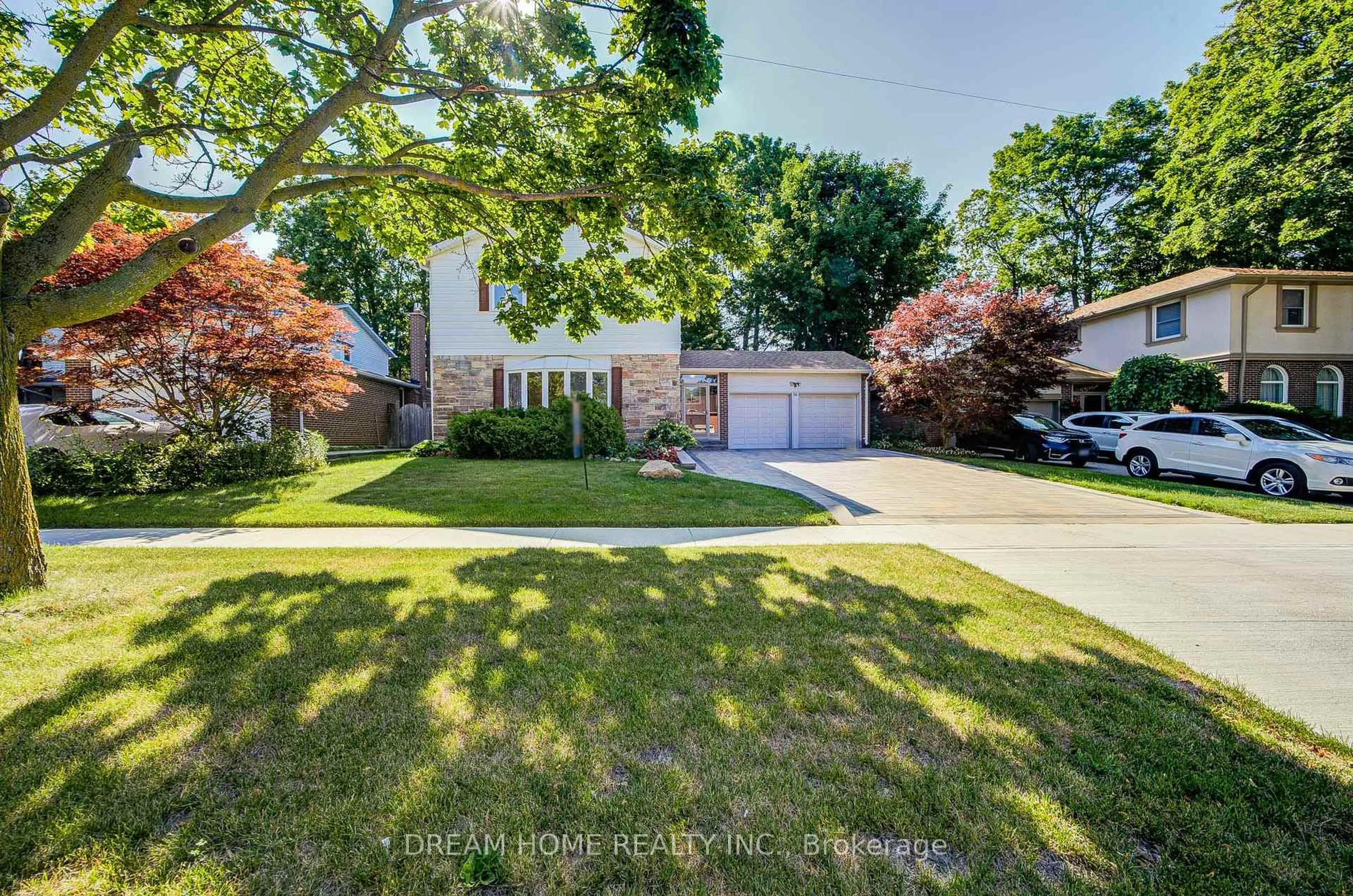 A pic from outside/outdoor area/front of a property/back of a property/a pic from drone, street for 811 Huntingwood Dr, Toronto Ontario M1T 2L8