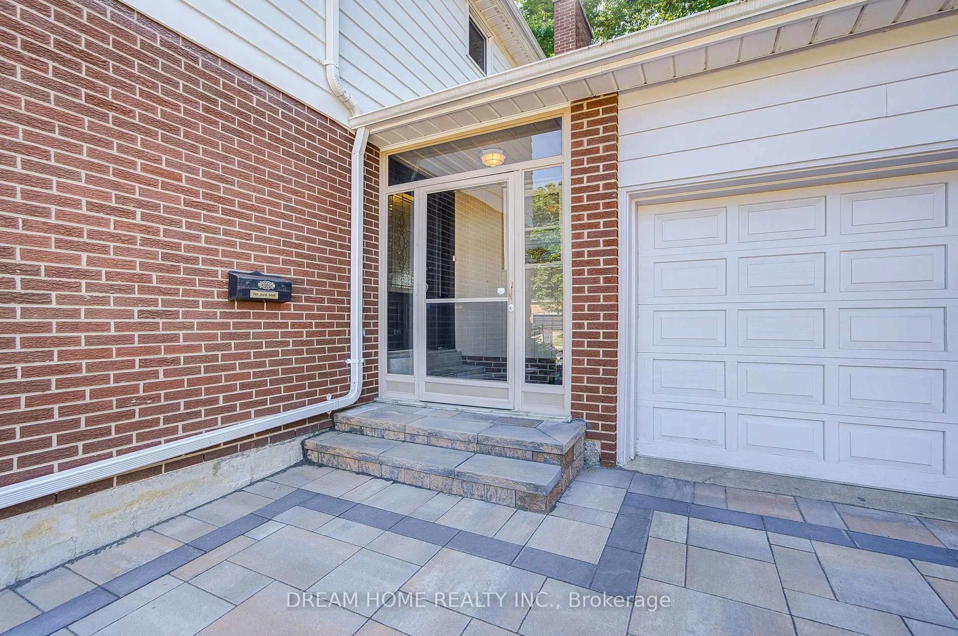 Home with brick exterior material, street for 811 Huntingwood Dr, Toronto Ontario M1T 2L8