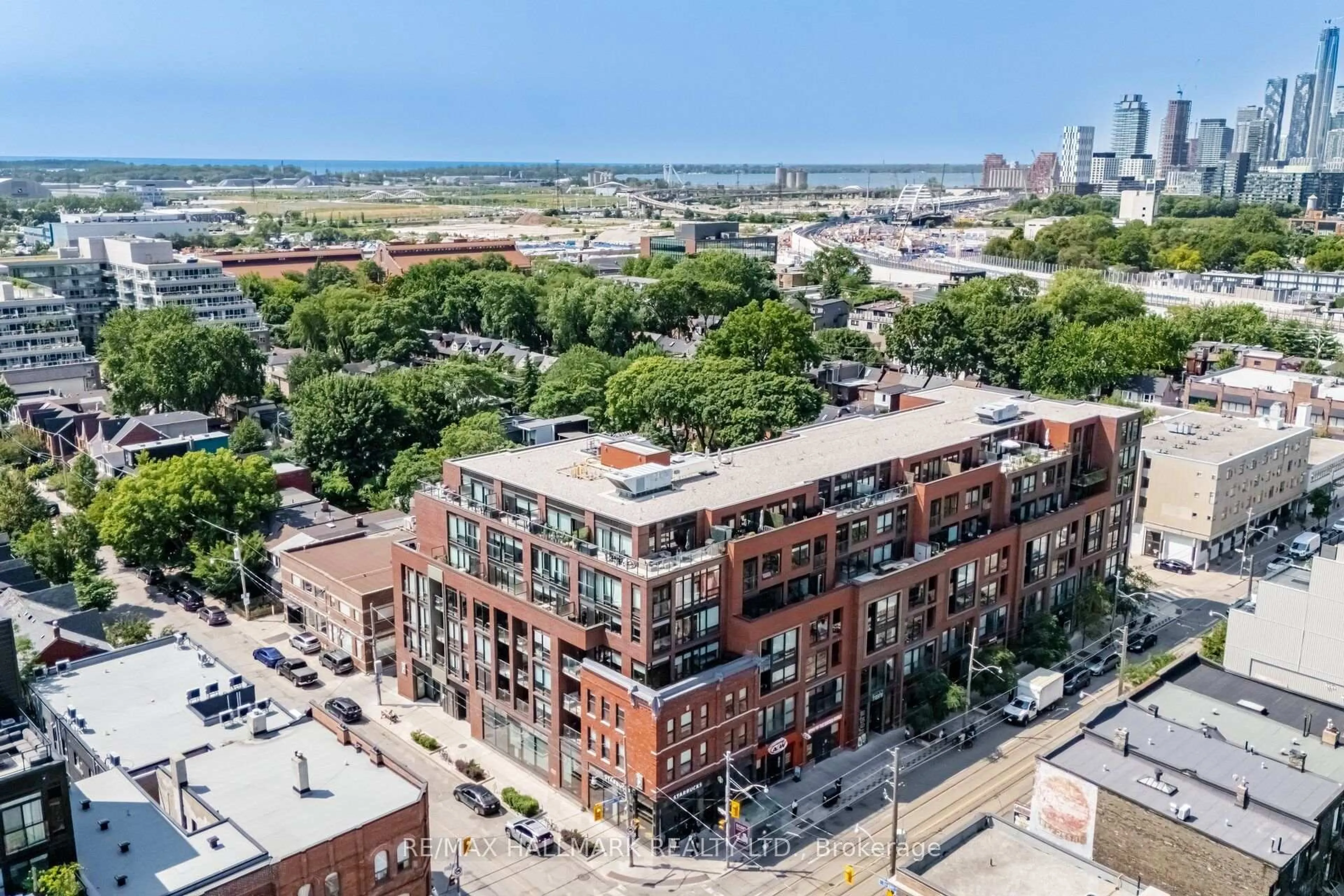 A pic from outside/outdoor area/front of a property/back of a property/a pic from drone, city buildings view from balcony for 246 Logan Ave #518, Toronto Ontario M4M 0E9