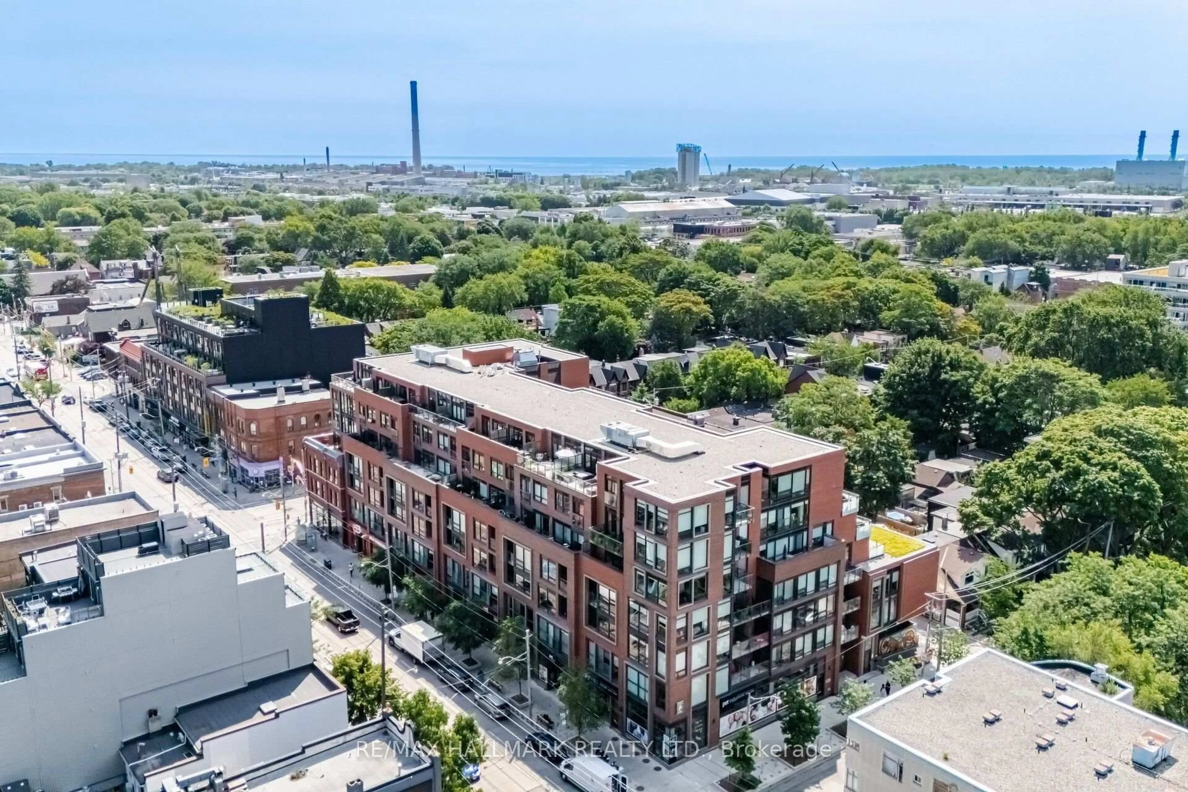 A pic from outside/outdoor area/front of a property/back of a property/a pic from drone, city buildings view from balcony for 246 Logan Ave #518, Toronto Ontario M4M 0E9