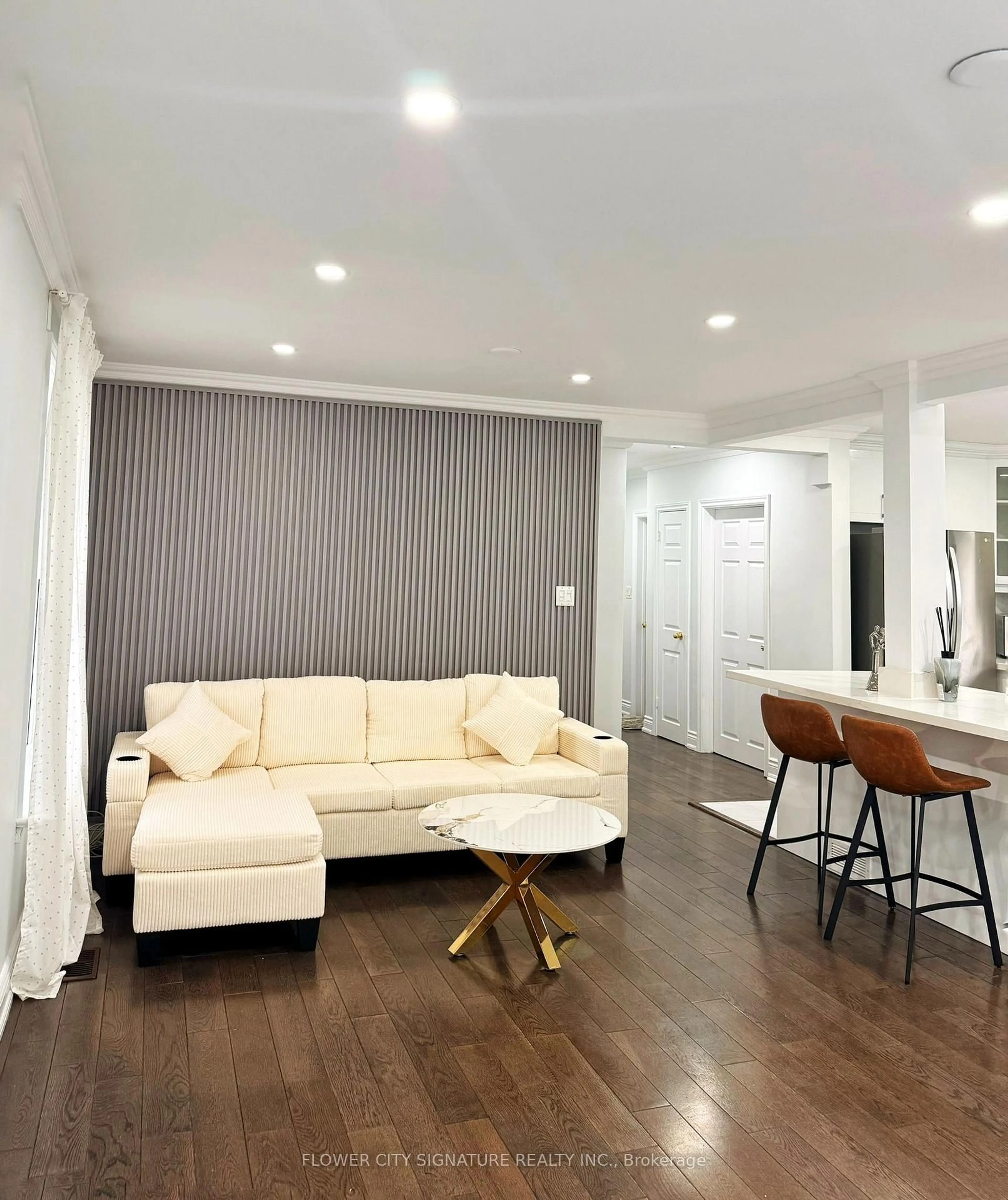 Living room with furniture, wood/laminate floor for 753 Scarborough Golf Club Rd, Toronto Ontario M1G 1H9